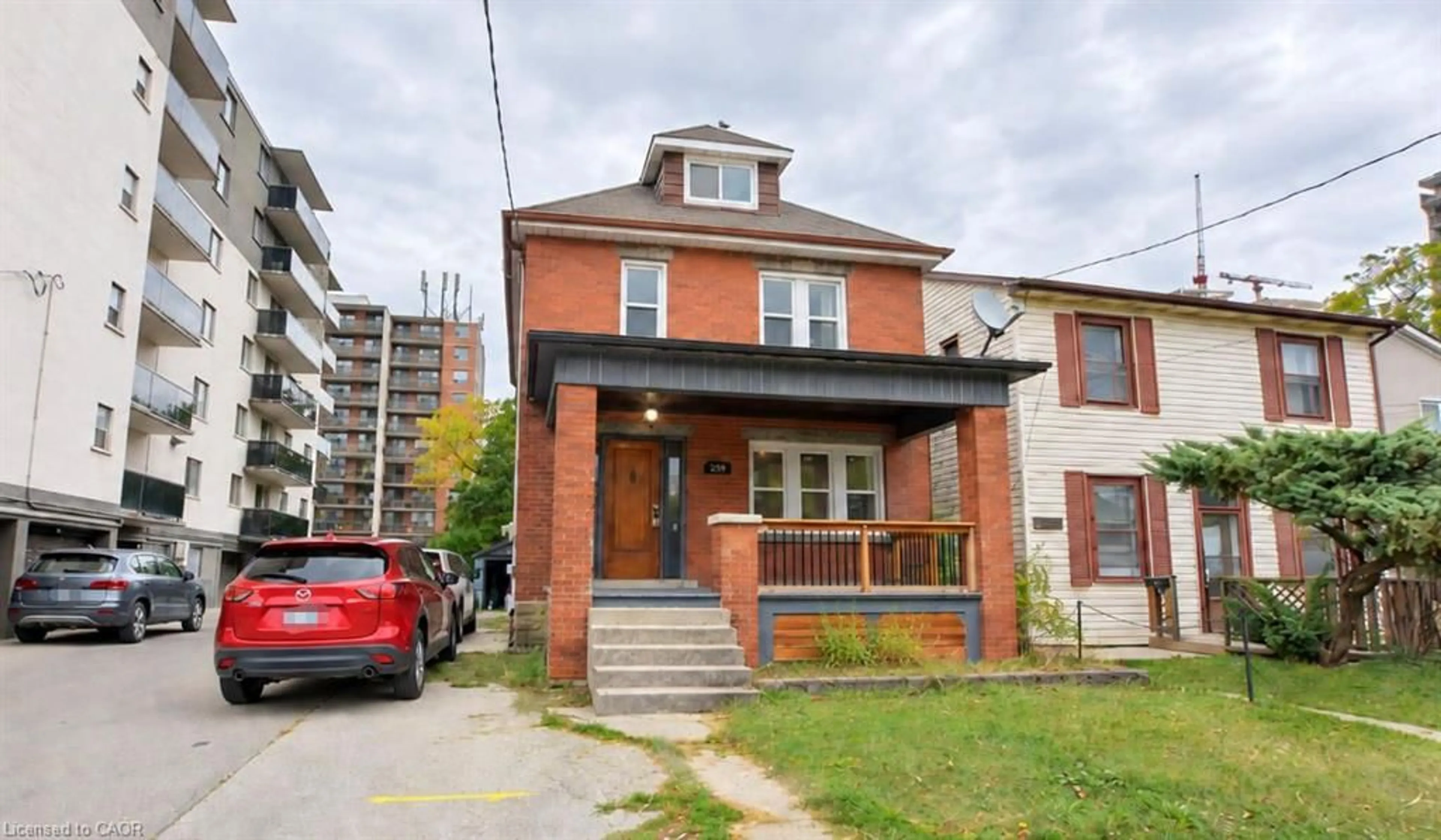 Home with brick exterior material, street for 230 Duke St, Hamilton Ontario L8P 1Y3