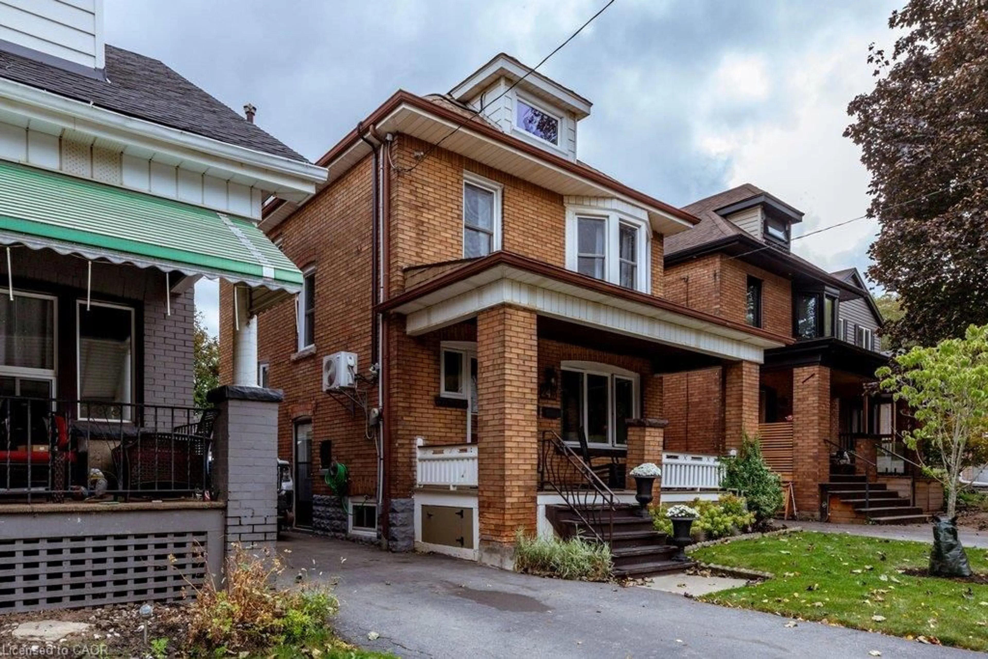 Home with brick exterior material, street for 243 Grosvenor Ave, Hamilton Ontario L8M 3L8