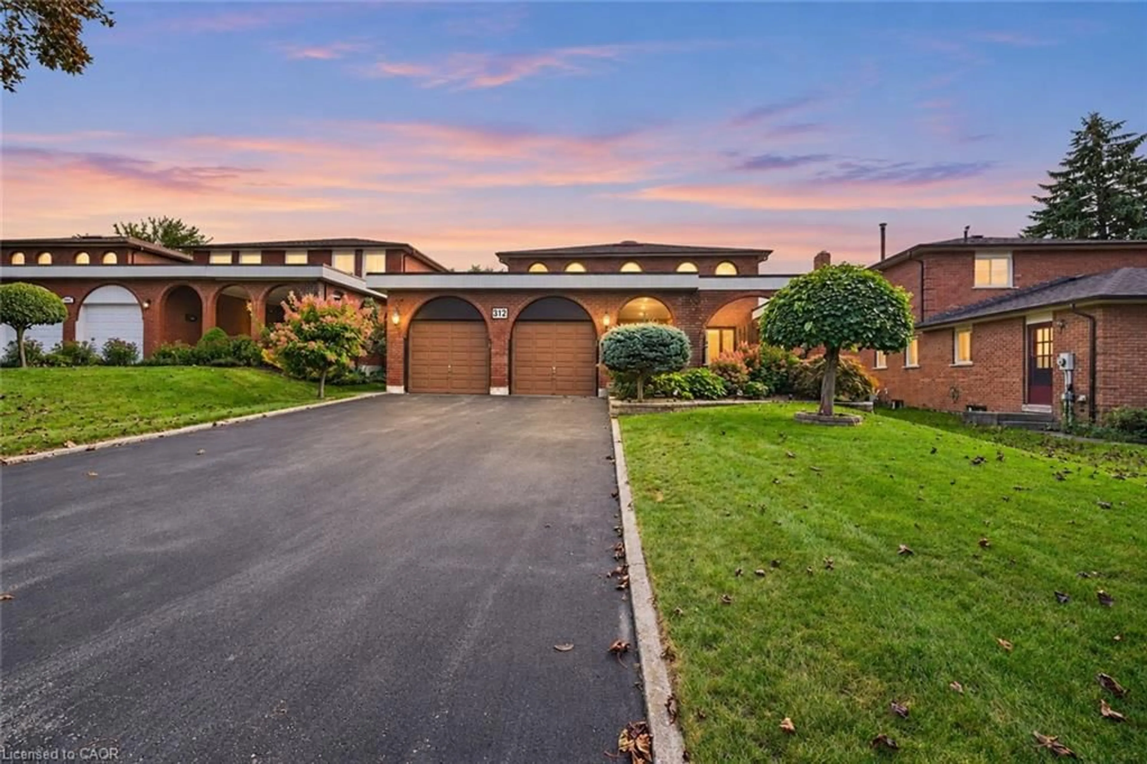 A pic from outside/outdoor area/front of a property/back of a property/a pic from drone, street for 312 Huntingwood Dr, Oshawa Ontario L1J 7C5