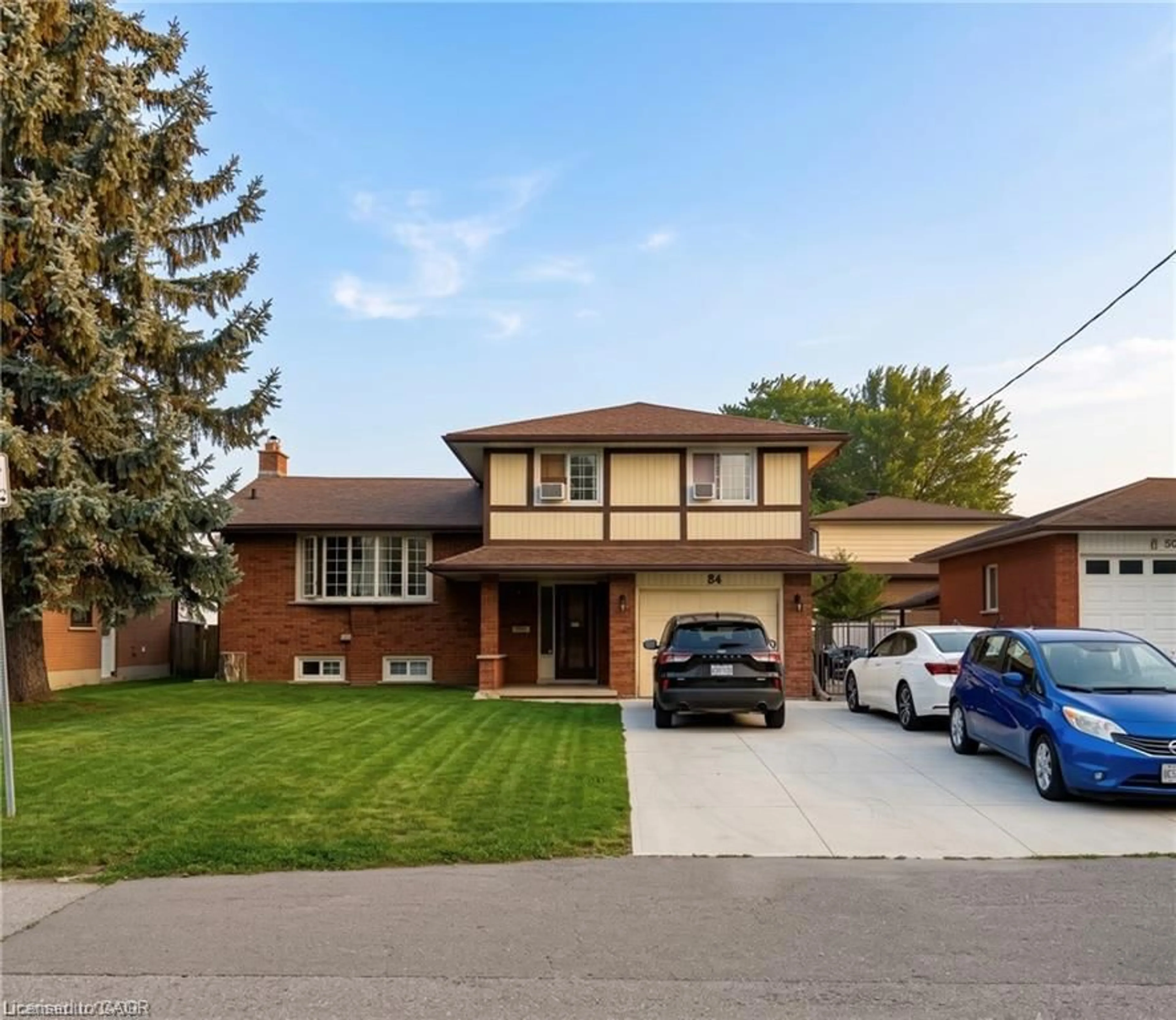 Home with brick exterior material, street for 84 Amherst Dr, Kitchener Ontario N2P 1C9