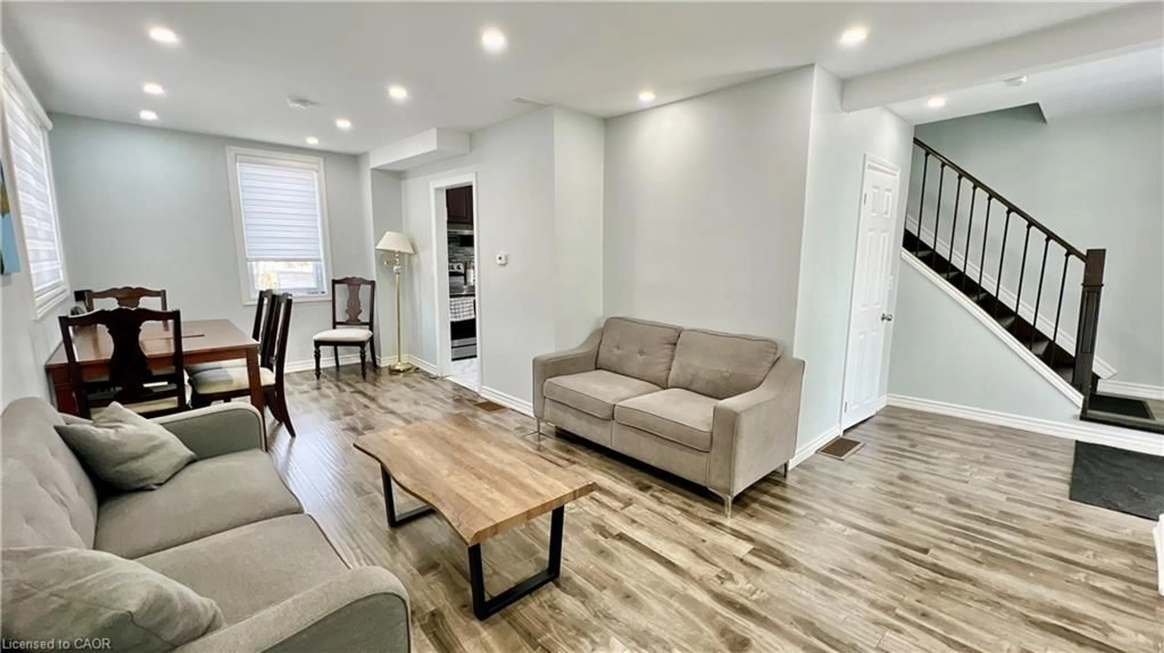 Living room with furniture, wood/laminate floor for 514 Frank St, South Bruce Peninsula Ontario N0H 2T0