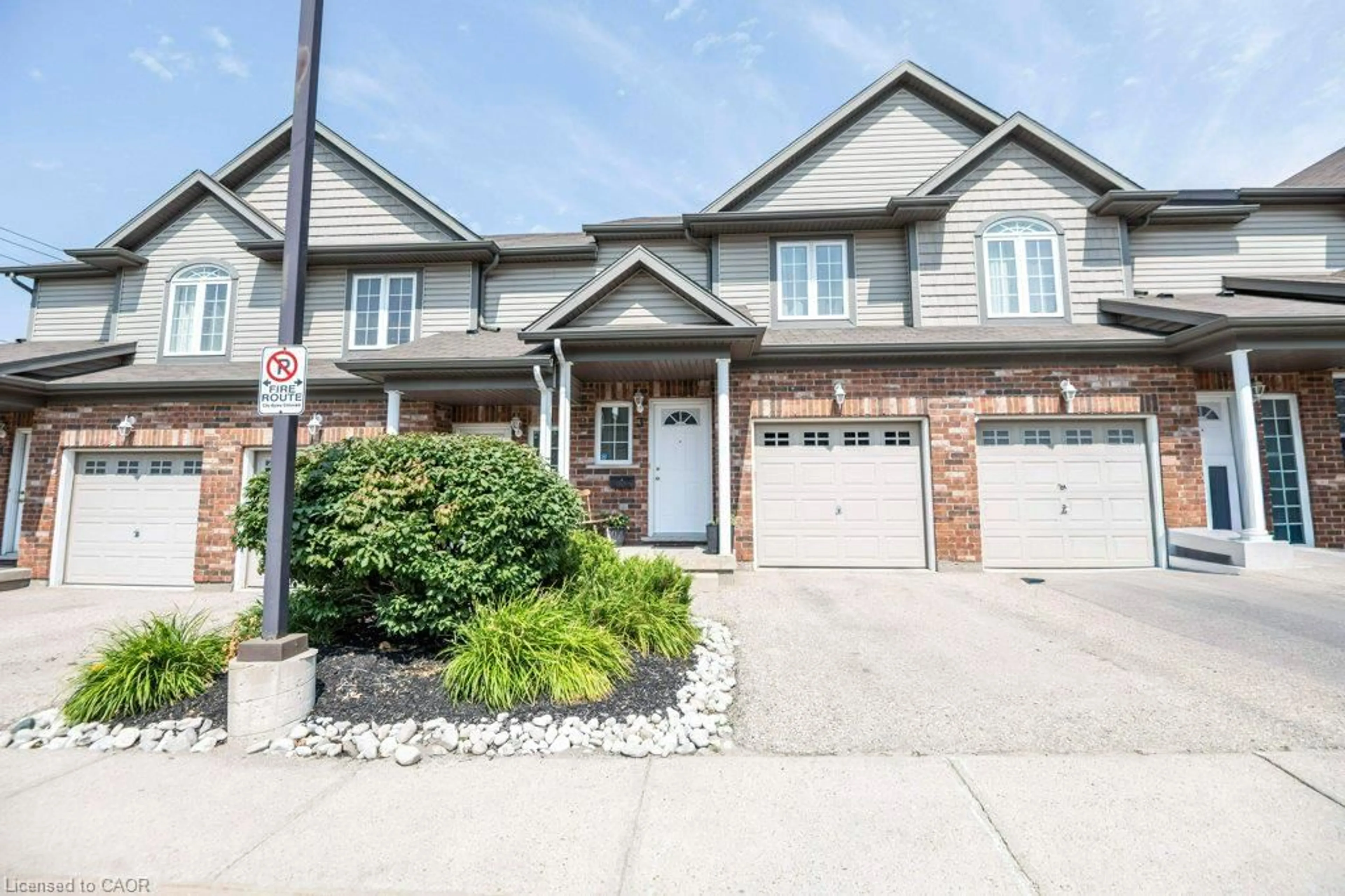Home with brick exterior material, street for 975 Strasburg Rd #3, Kitchener Ontario N2E 0A8