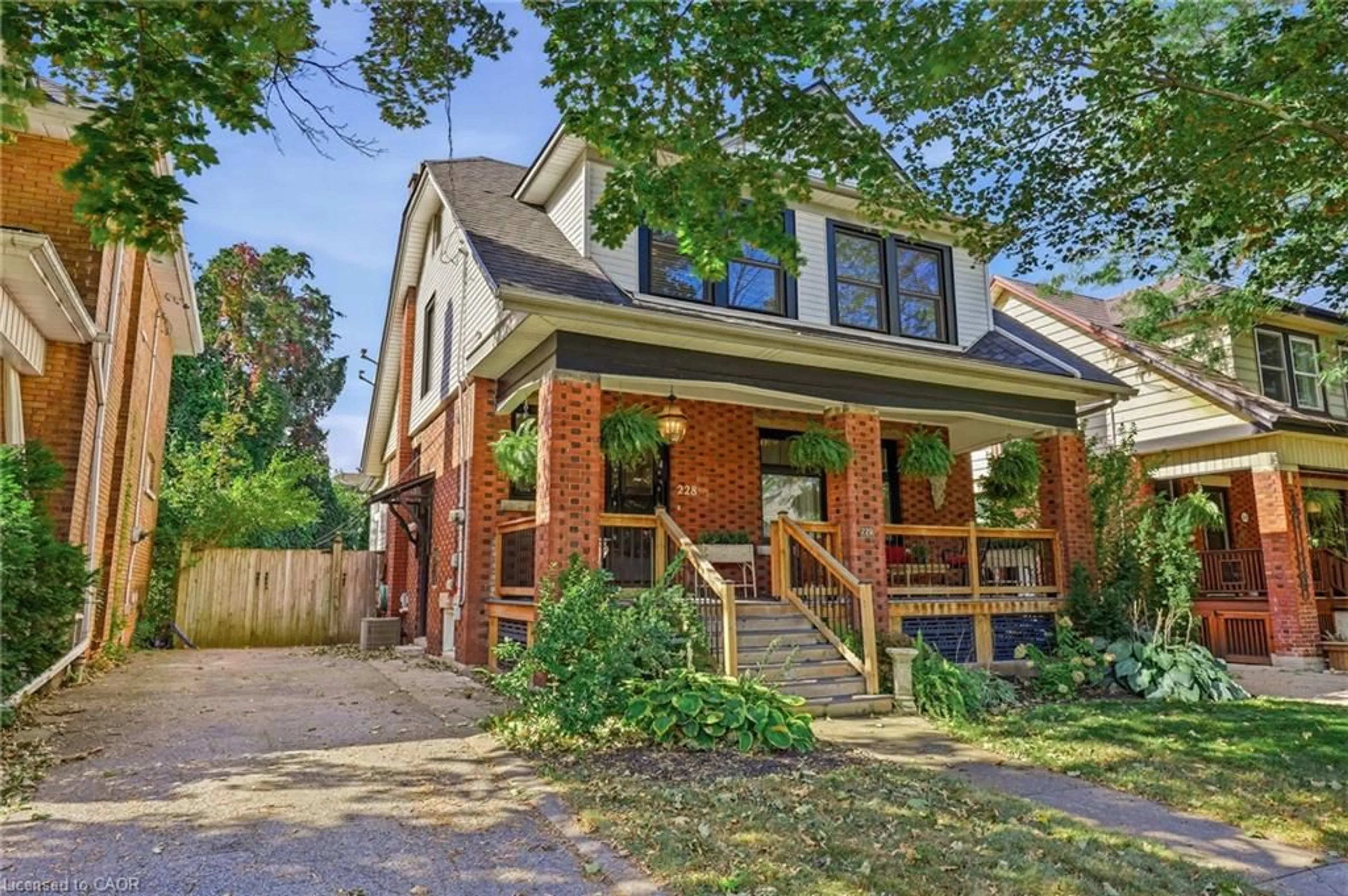 Home with brick exterior material, street for 228 Sherman Ave, Hamilton Ontario L8M 2R3