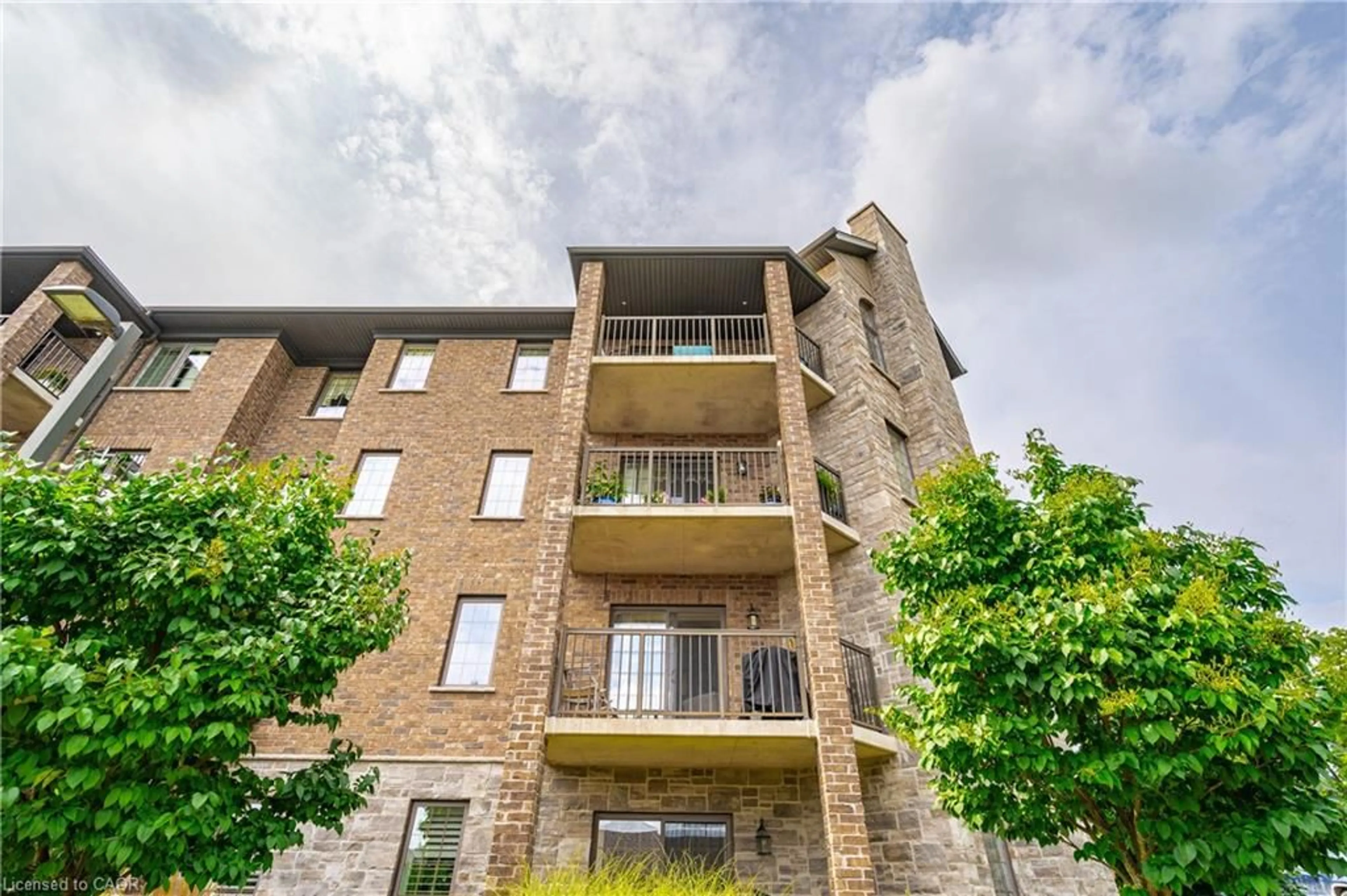 A pic from outside/outdoor area/front of a property/back of a property/a pic from drone, building for 6492 Gerrie Rd #207, Elora Ontario N0B 1S0