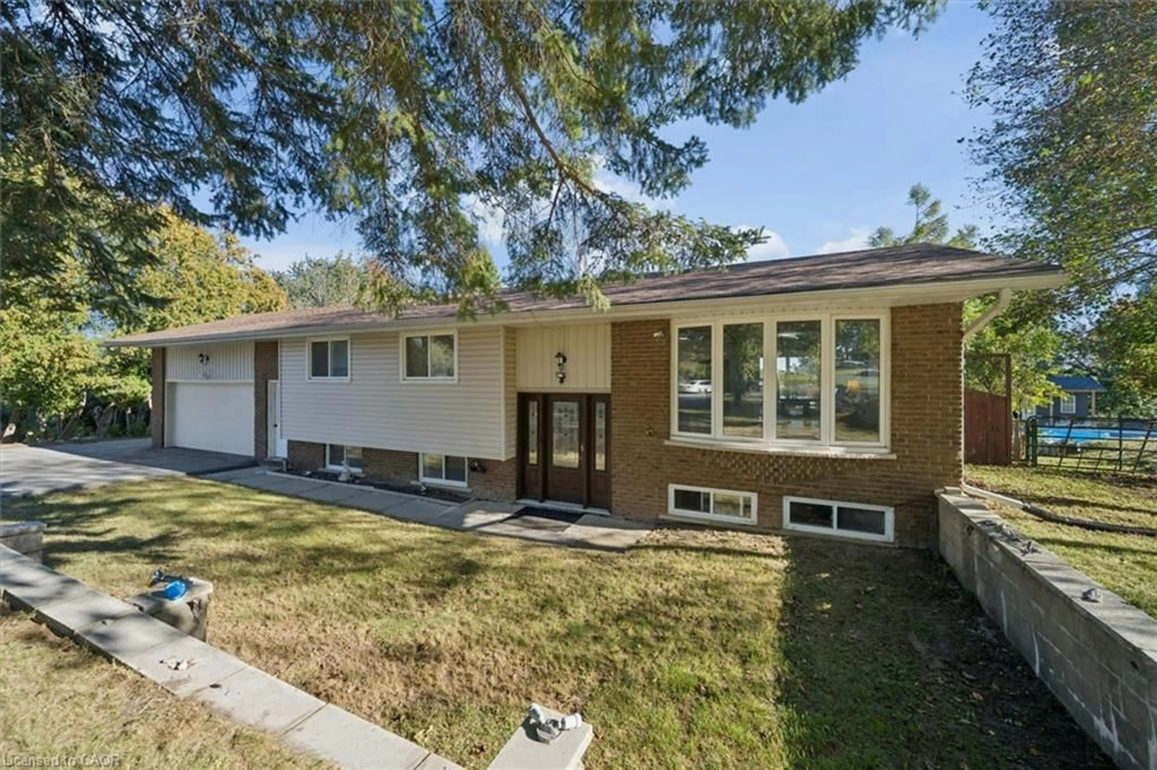 Home with brick exterior material, street for 210 Patricia Cres, Selwyn Ontario K9J 6X4