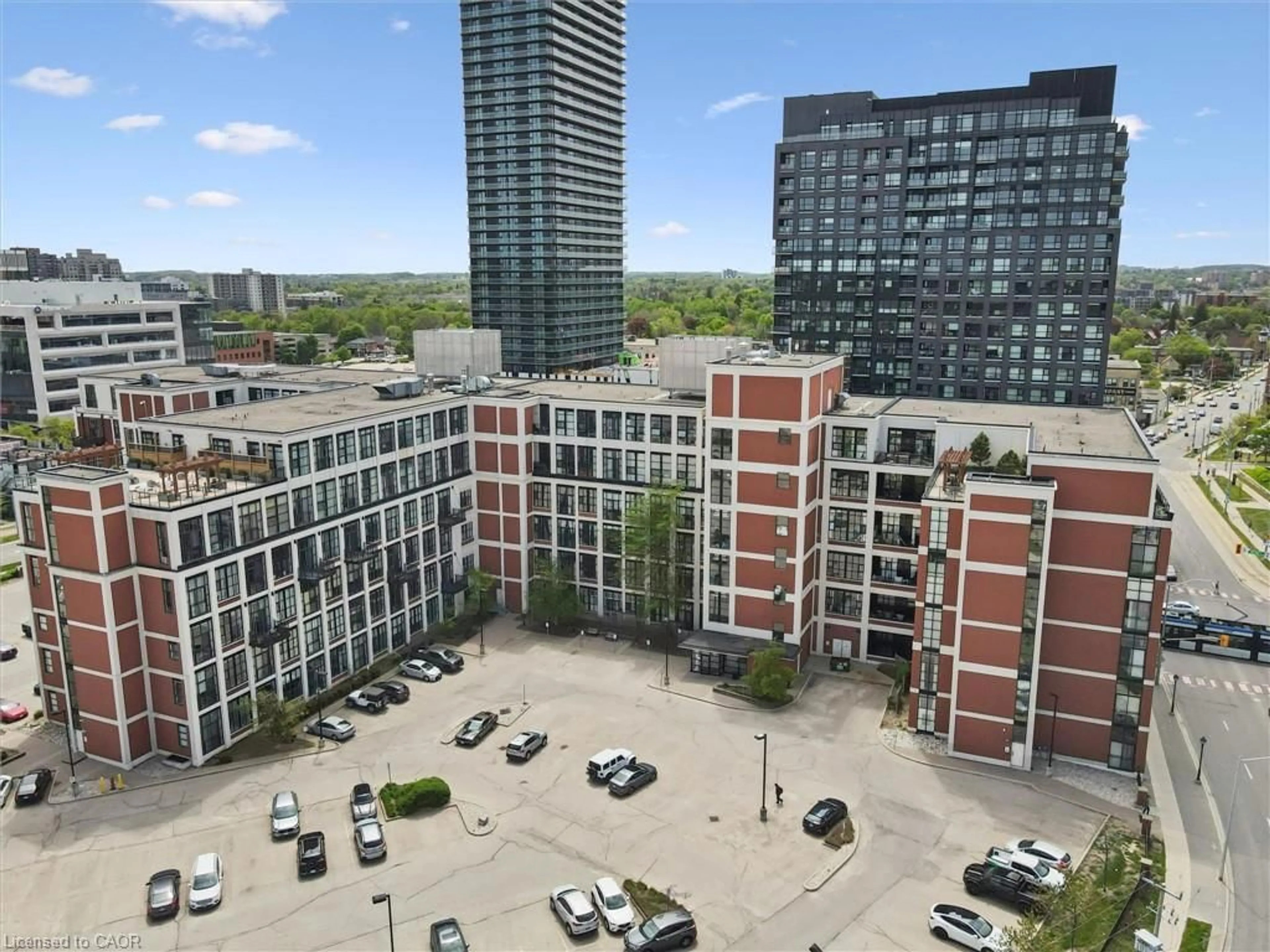 A pic from outside/outdoor area/front of a property/back of a property/a pic from drone, city buildings view from balcony for 410 King St #218, Kitchener Ontario N2G 1C3