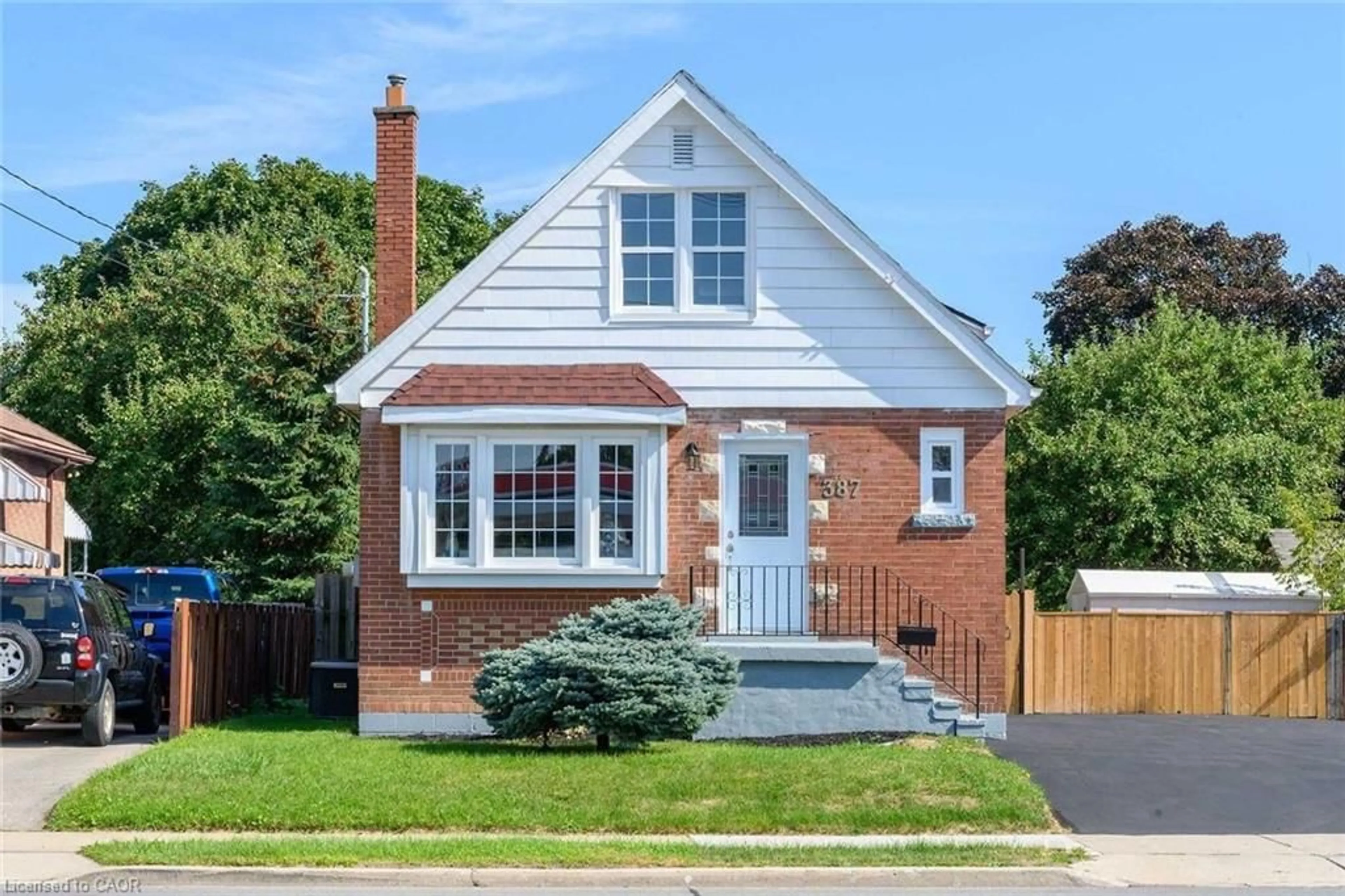 Home with brick exterior material, street for 387 Upper Gage Ave, Hamilton Ontario L8V 4H8