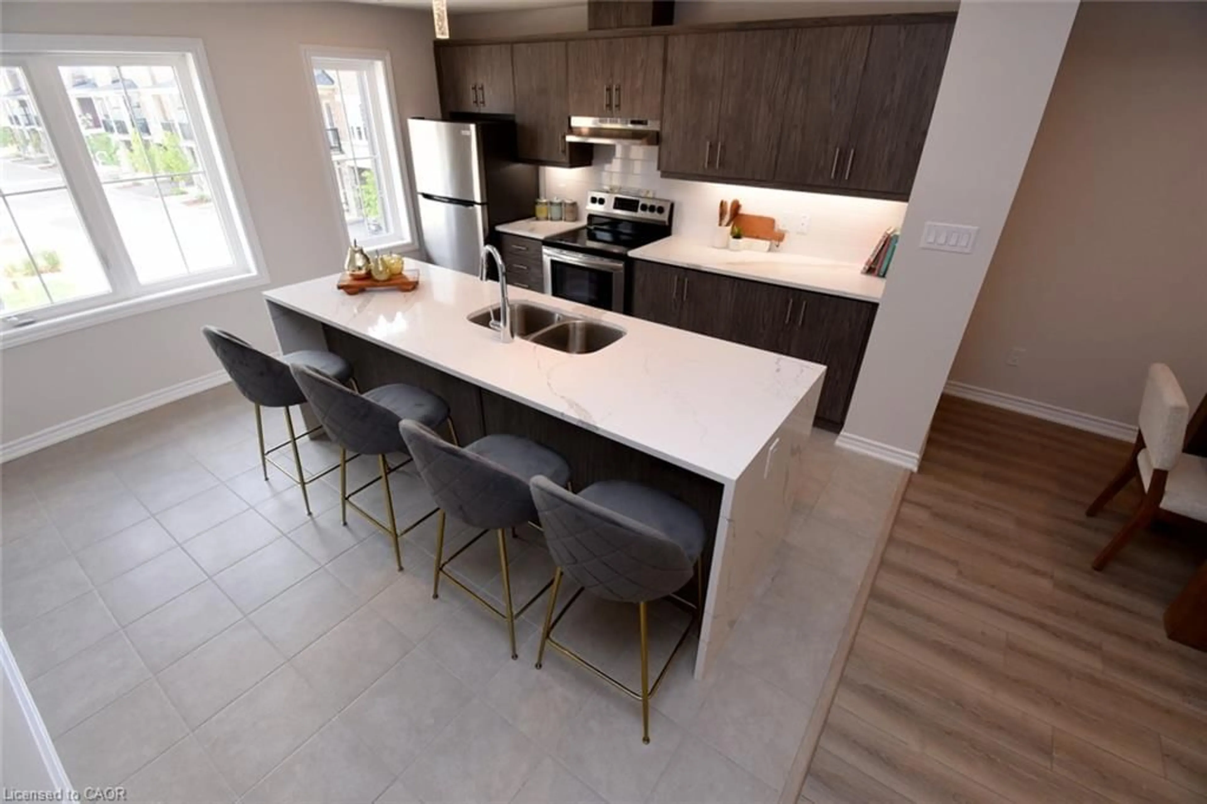 Open concept kitchen, ceramic/tile floor for 677 Park Rd #2, Brantford Ontario N3R 0A2