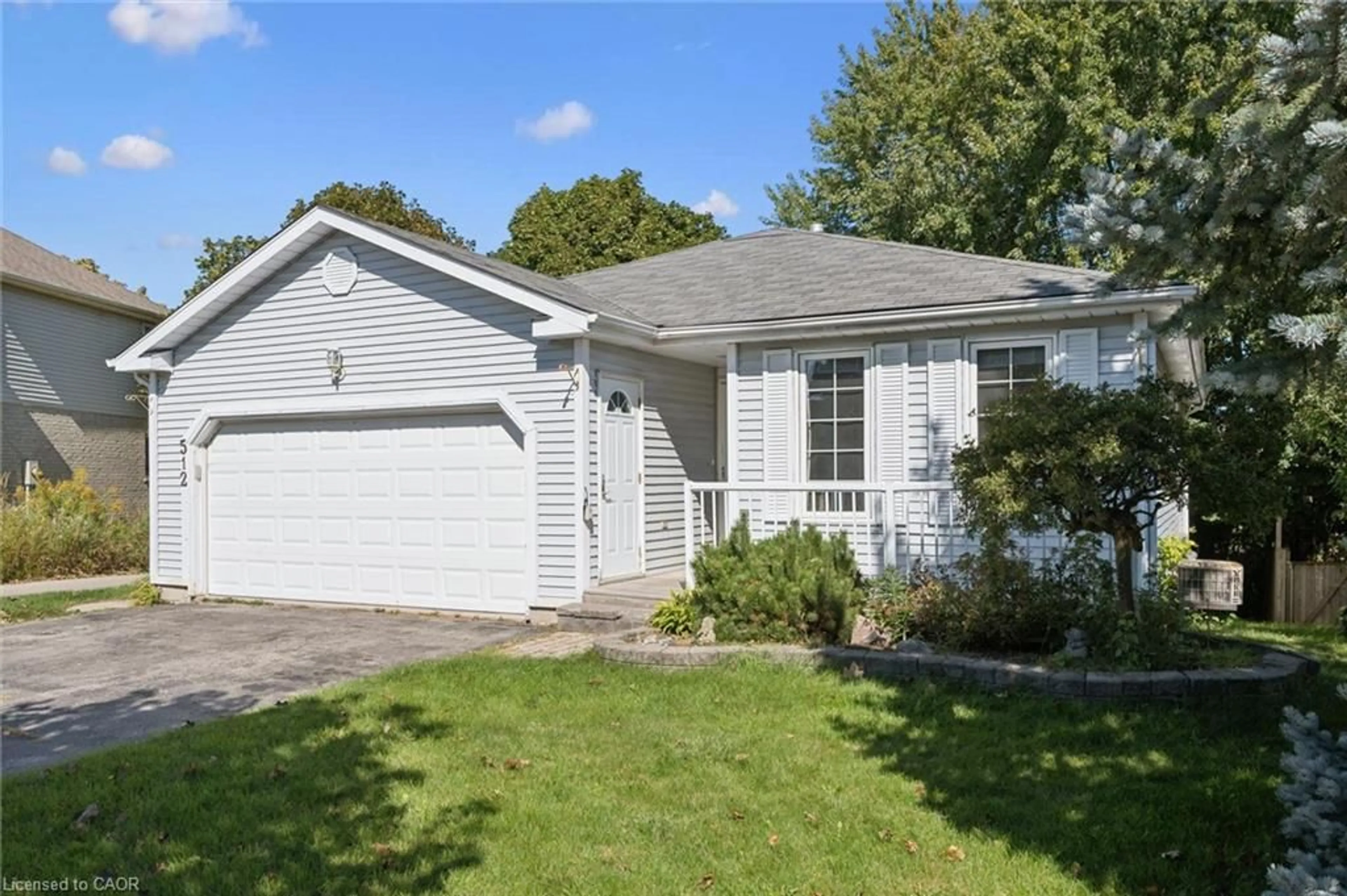 Home with vinyl exterior material, street for 512 Thorndale Dr, Waterloo Ontario N2T 2A2