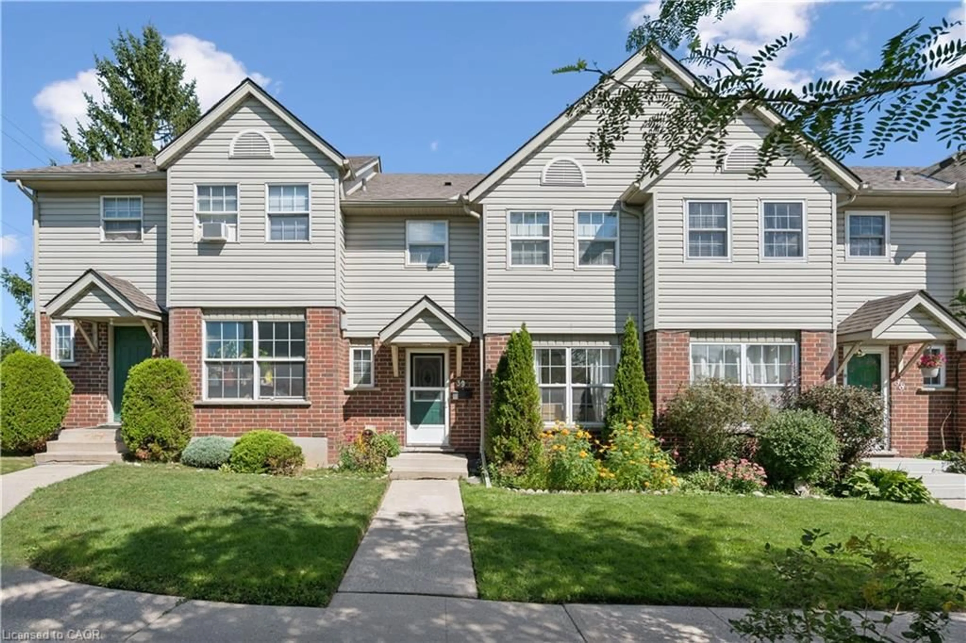 Home with brick exterior material, street for 26 Poplar Dr #39, Cambridge Ontario N3C 4A4