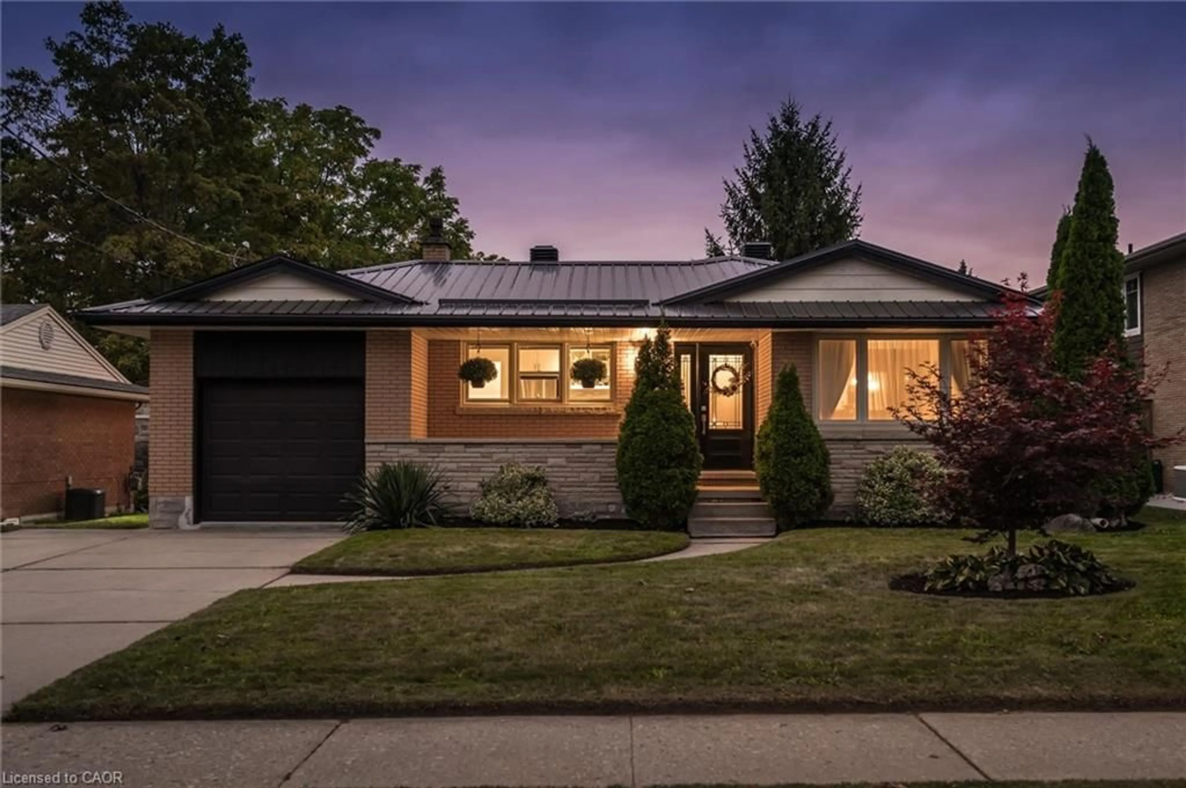 Home with brick exterior material, street for 91 Eton Dr, Kitchener Ontario N2B 1N9