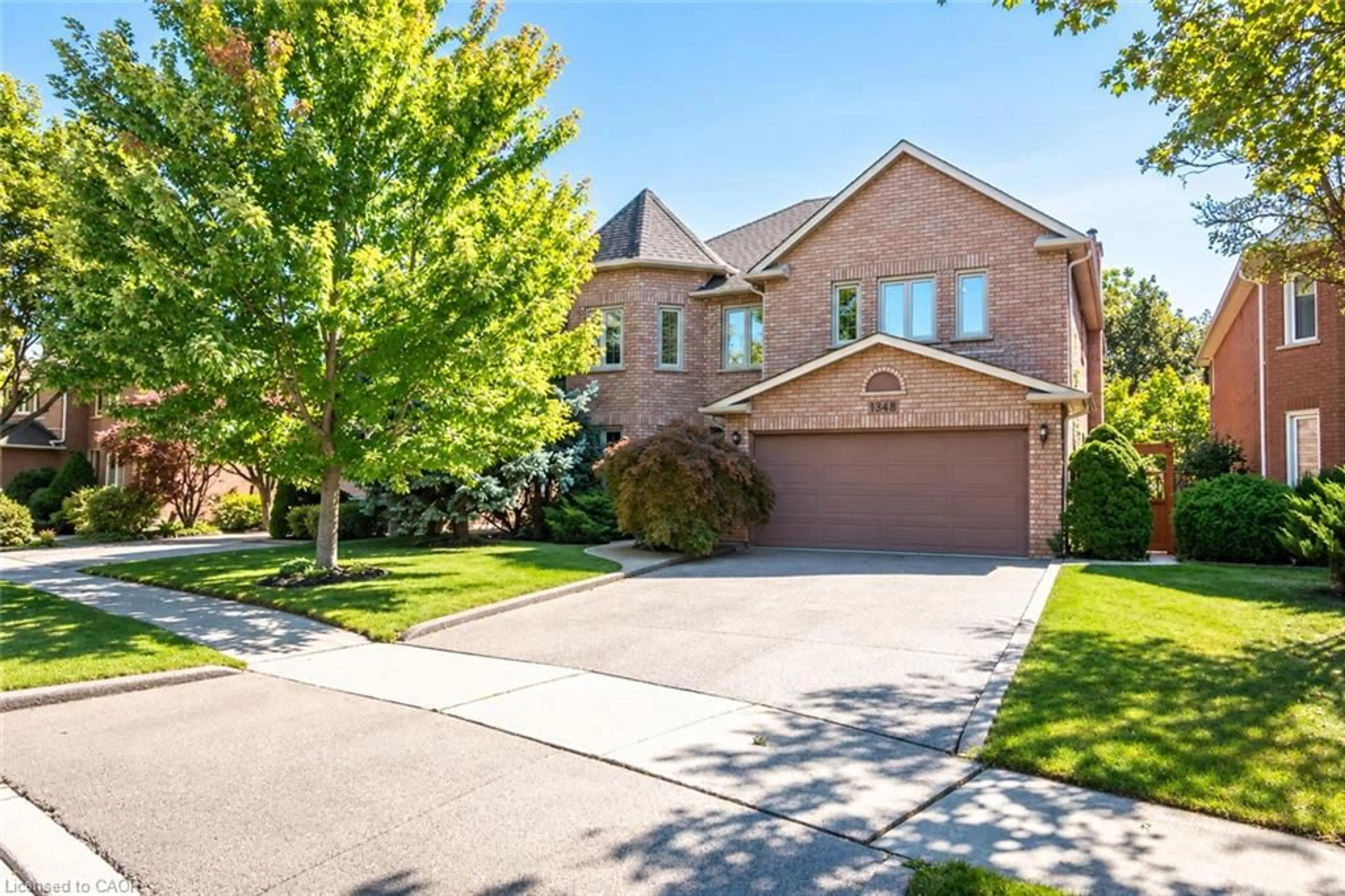 Home with brick exterior material, street for 1348 Fieldcrest Lane, Oakville Ontario L6M 2W8