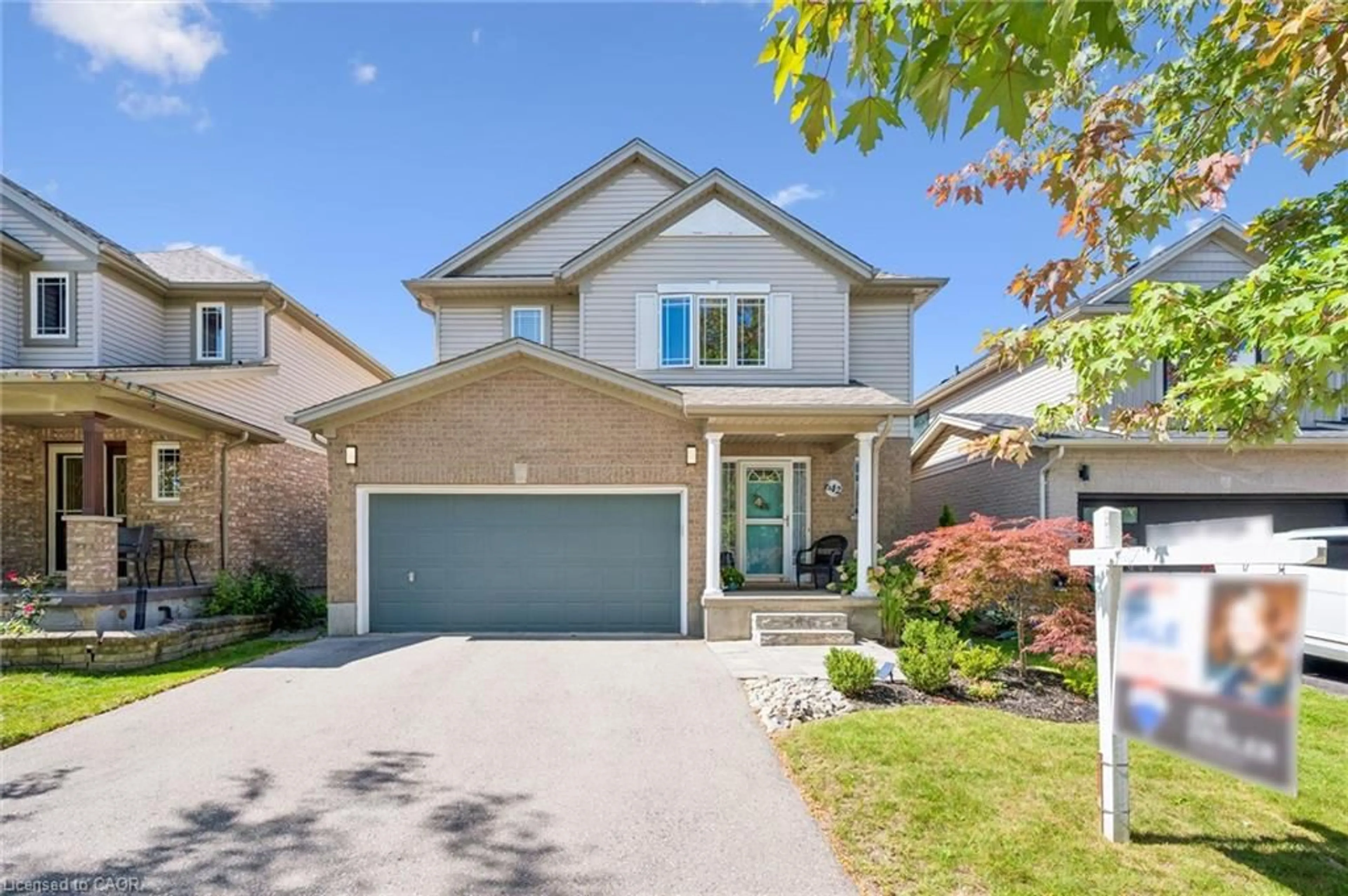 Home with brick exterior material, street for 642 Interlaken Dr, Waterloo Ontario N2T 2Y5
