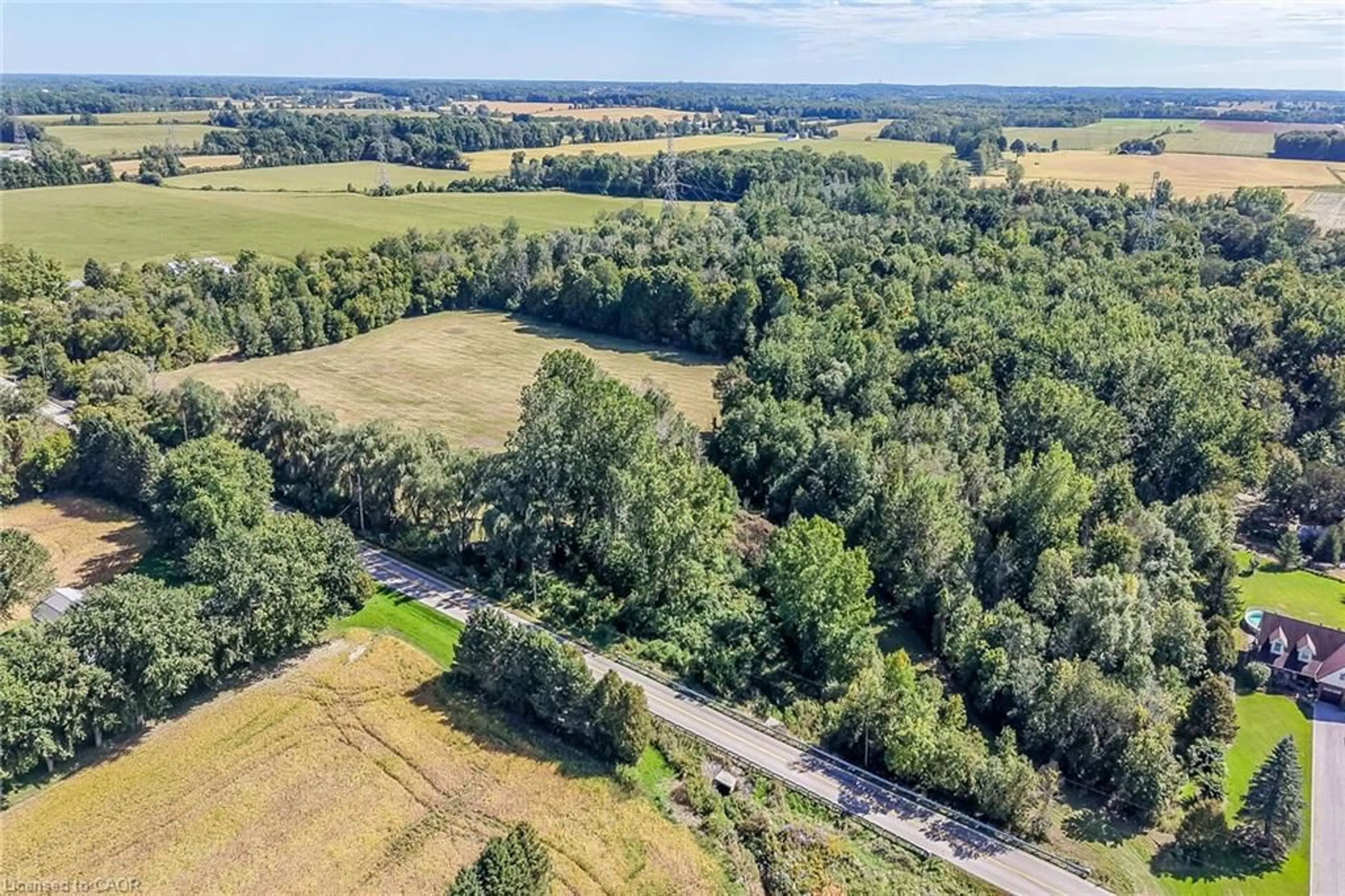 A pic from outside/outdoor area/front of a property/back of a property/a pic from drone, forest/trees view for PT LT 1-2 Norfolk County Rd 19 E, Wilsonville Ontario N0E 1Z0
