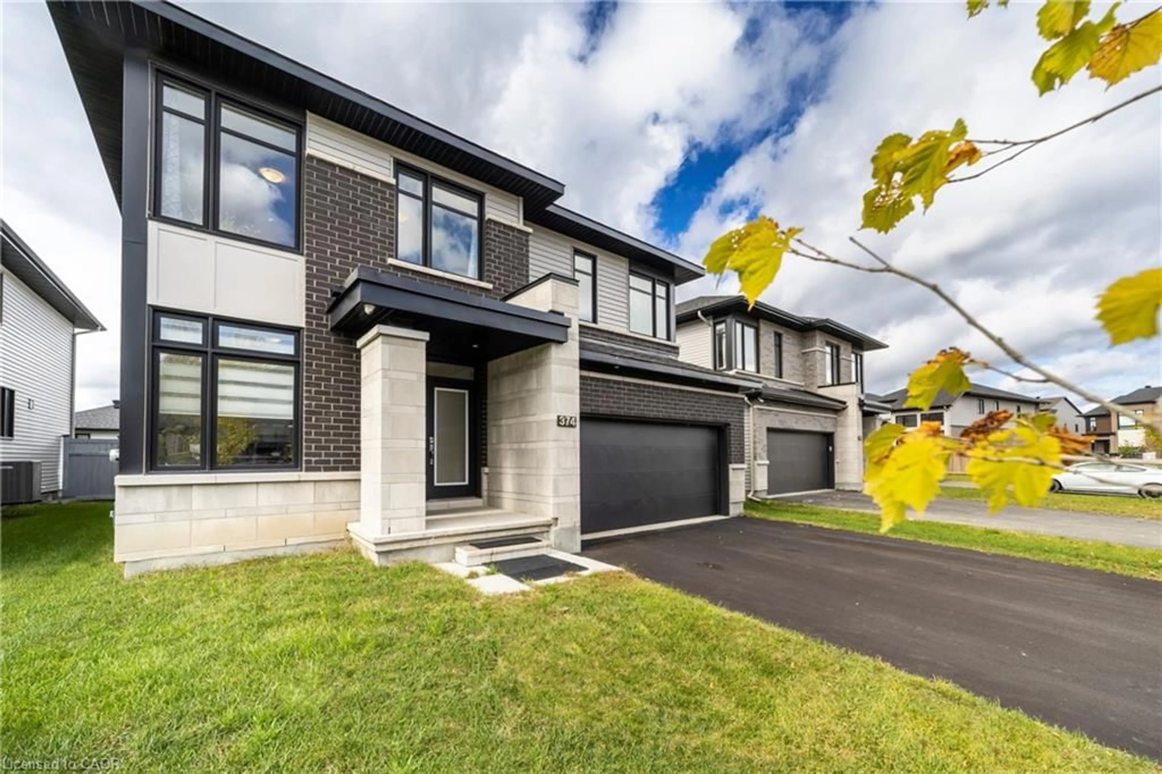 Home with brick exterior material, street for 374 Big Dipper St, Manotick Ontario K4M 0J3