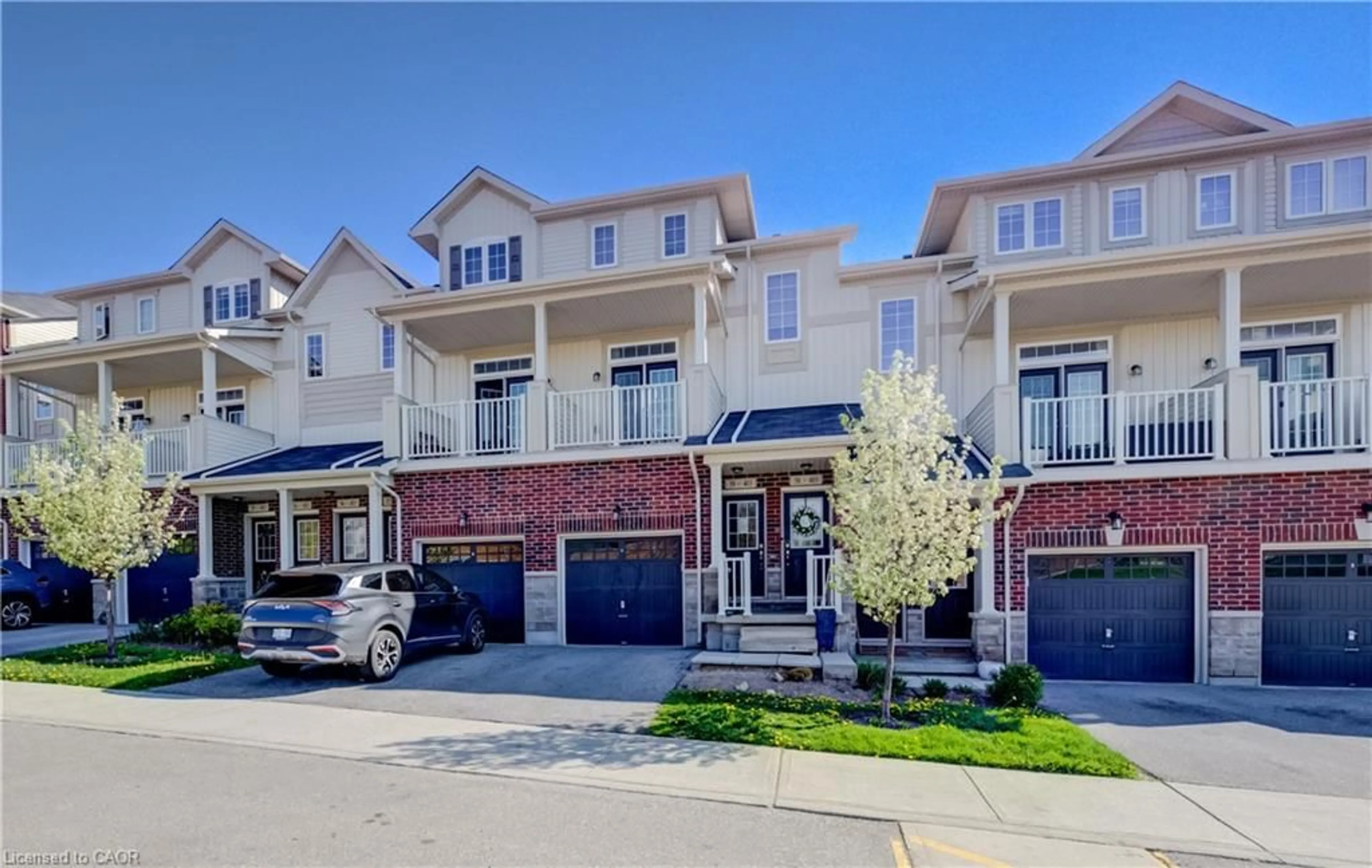 A pic from outside/outdoor area/front of a property/back of a property/a pic from drone, street for 403 Westwood Dr #59, Kitchener Ontario N2M 0B5
