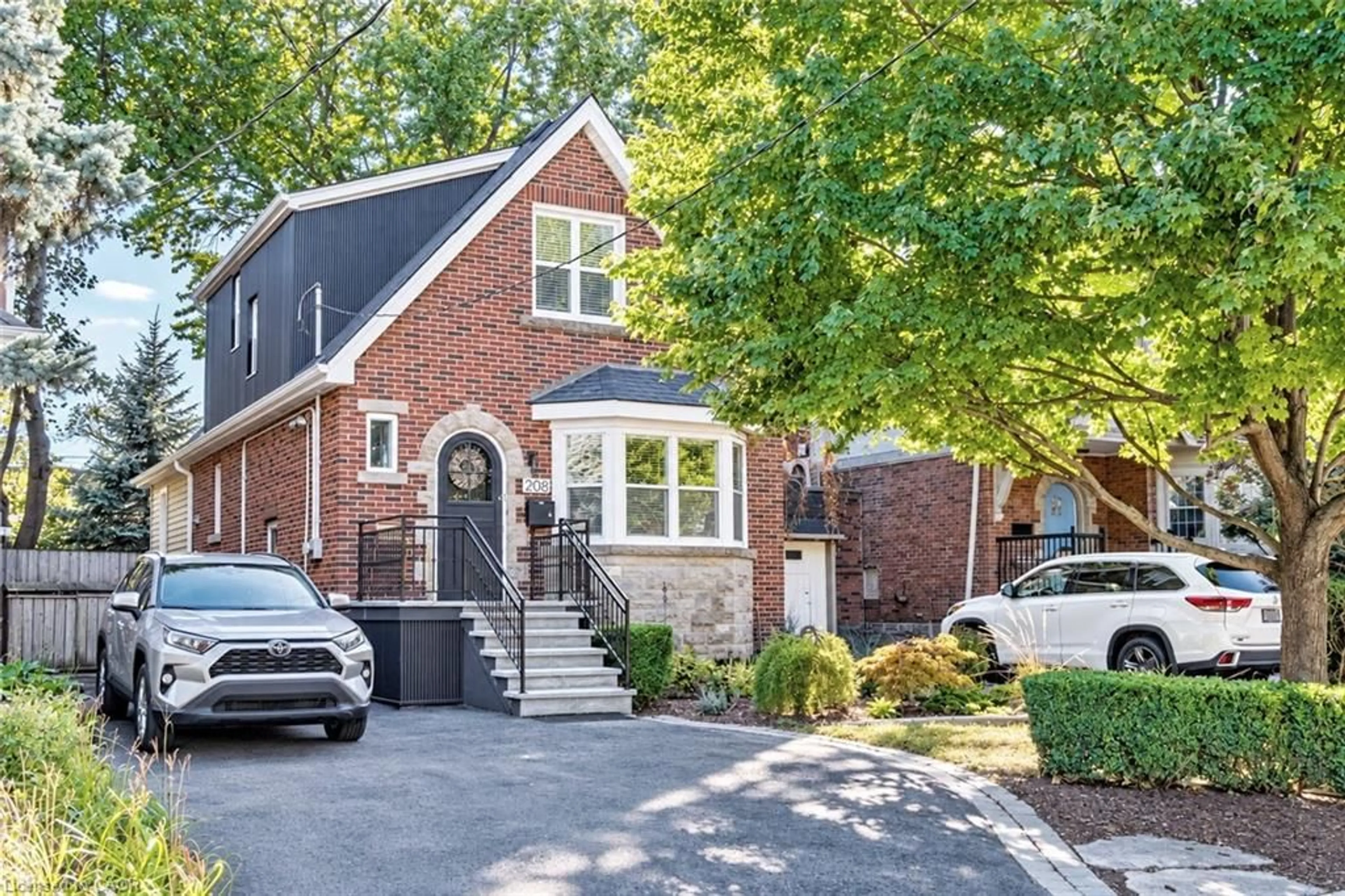 Home with brick exterior material, street for 208 Cline Ave, Hamilton Ontario L8S 3Z9