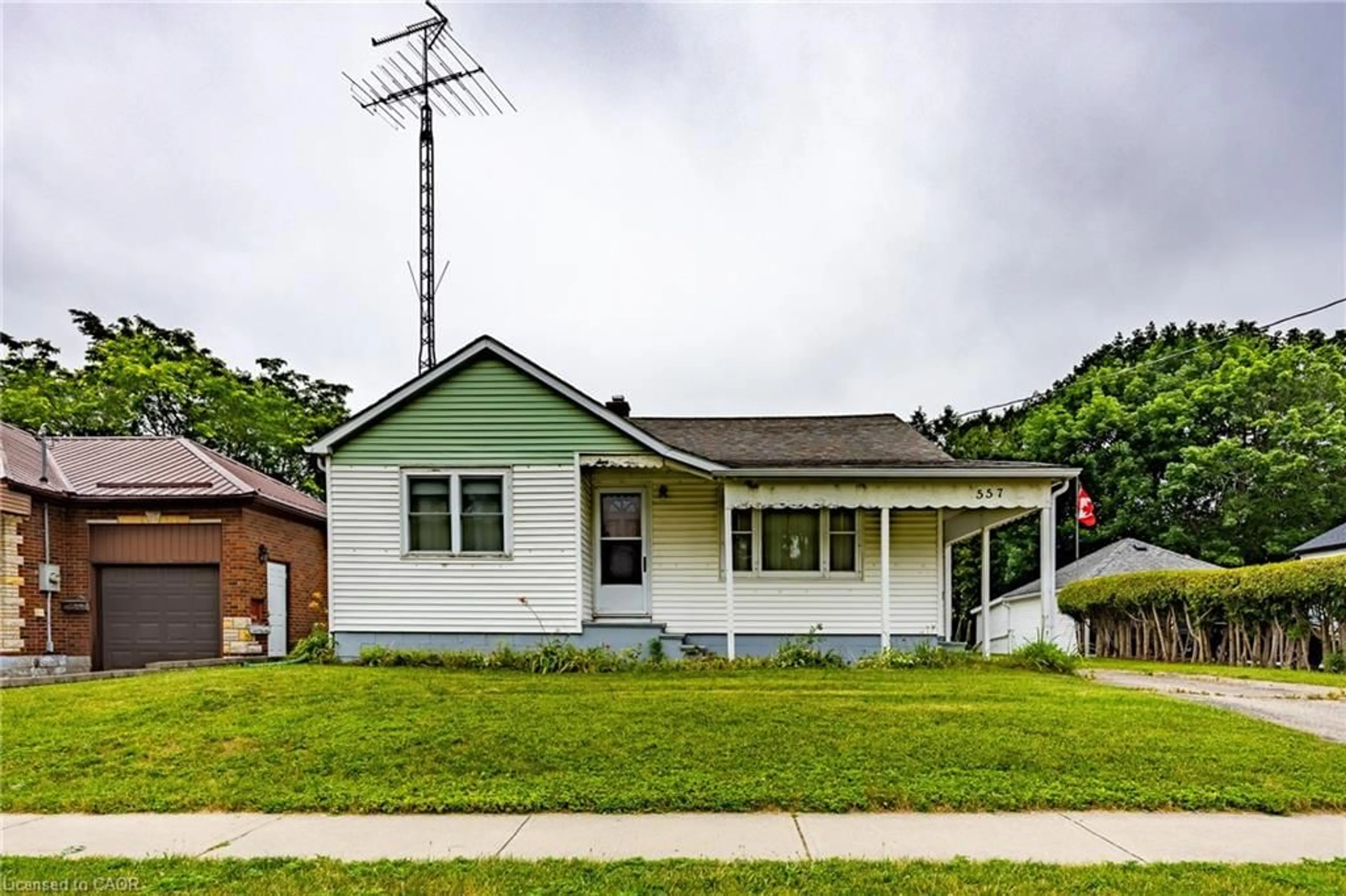 Home with brick exterior material, street for 557 Orchard Ave, Delhi Ontario N4B 2H4
