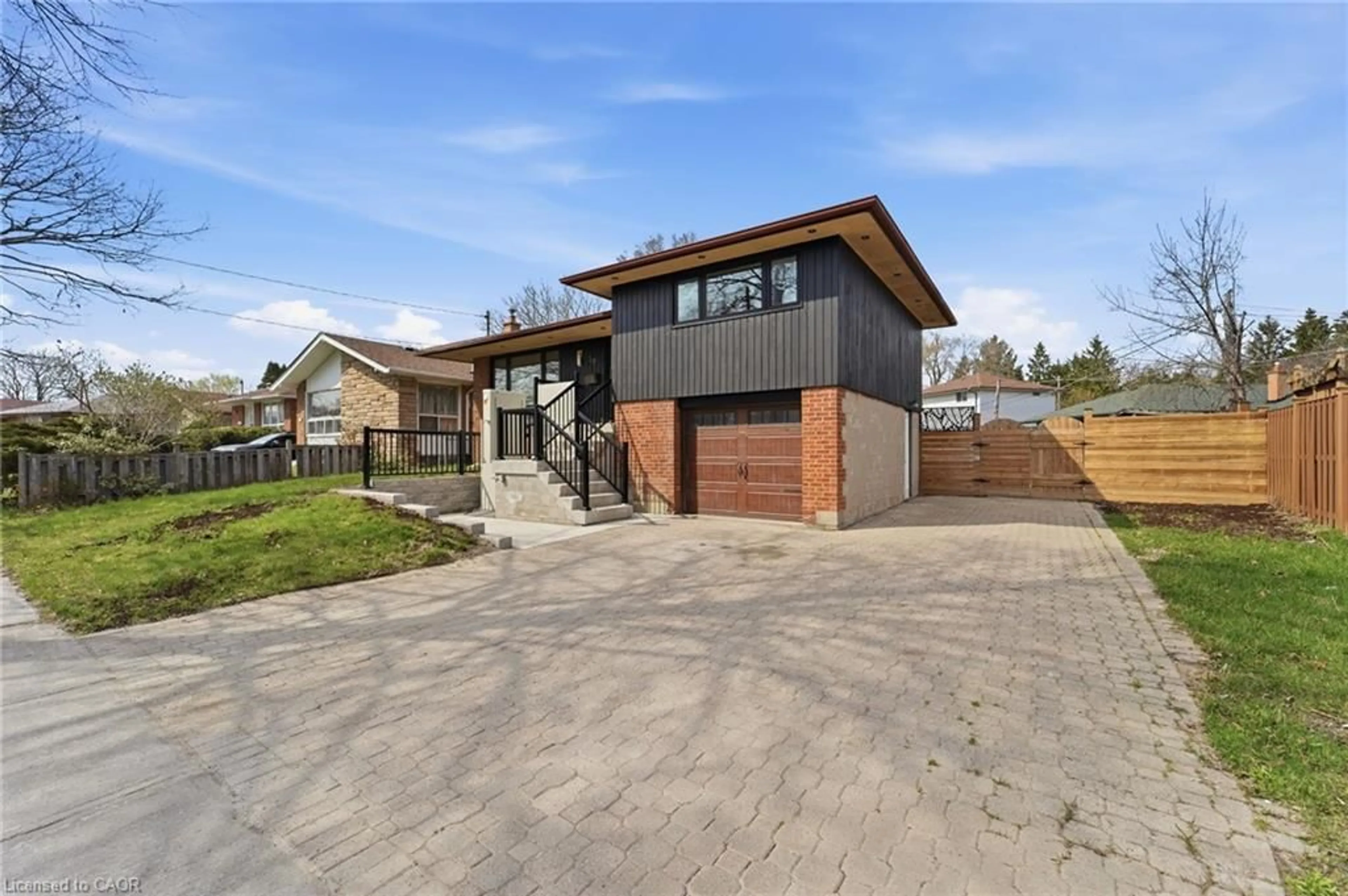 Home with brick exterior material, street for 39 Earlton Rd, Scarborough Ontario M1T 2R4