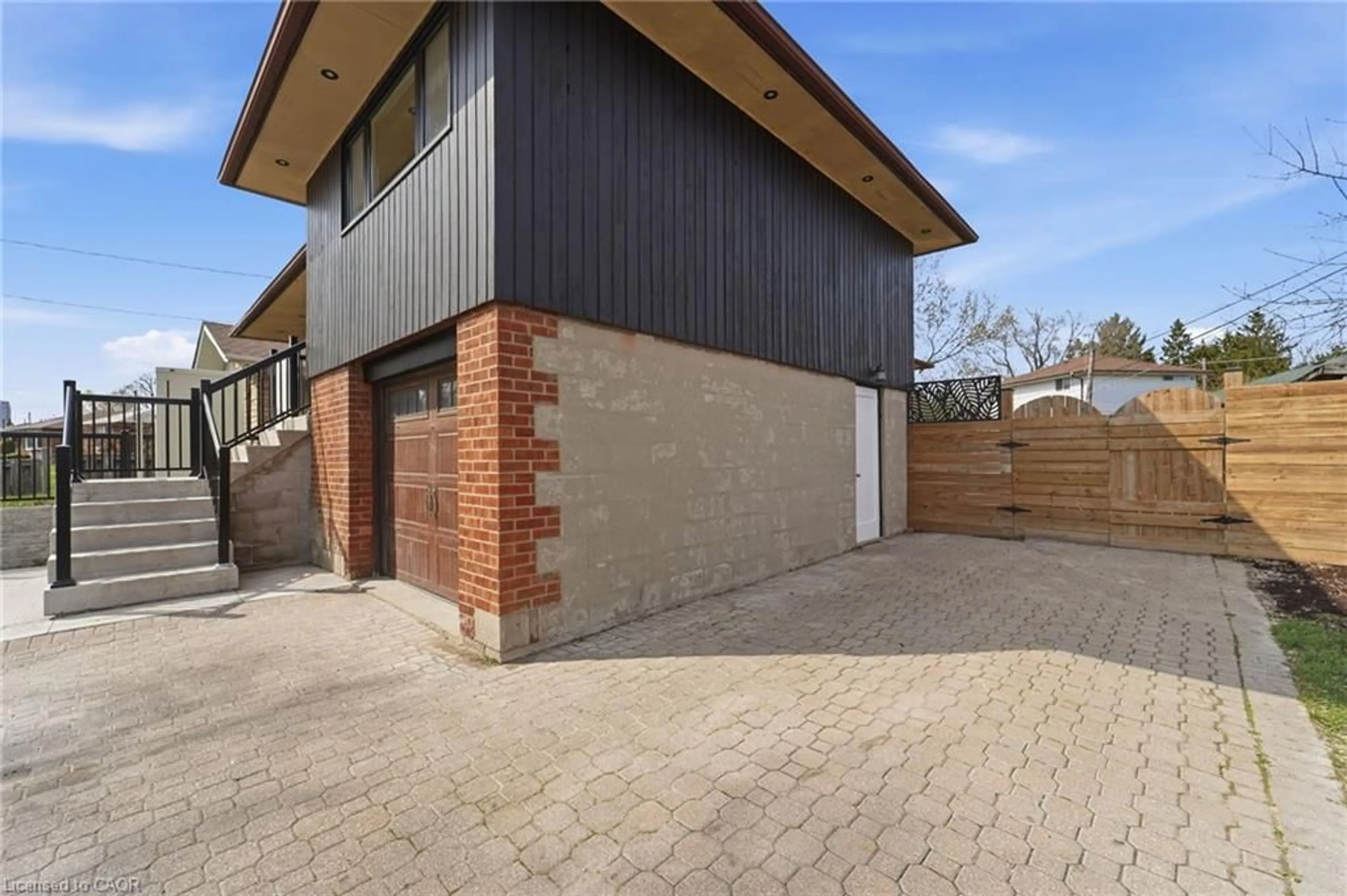 Home with brick exterior material, street for 39 Earlton Rd, Scarborough Ontario M1T 2R4