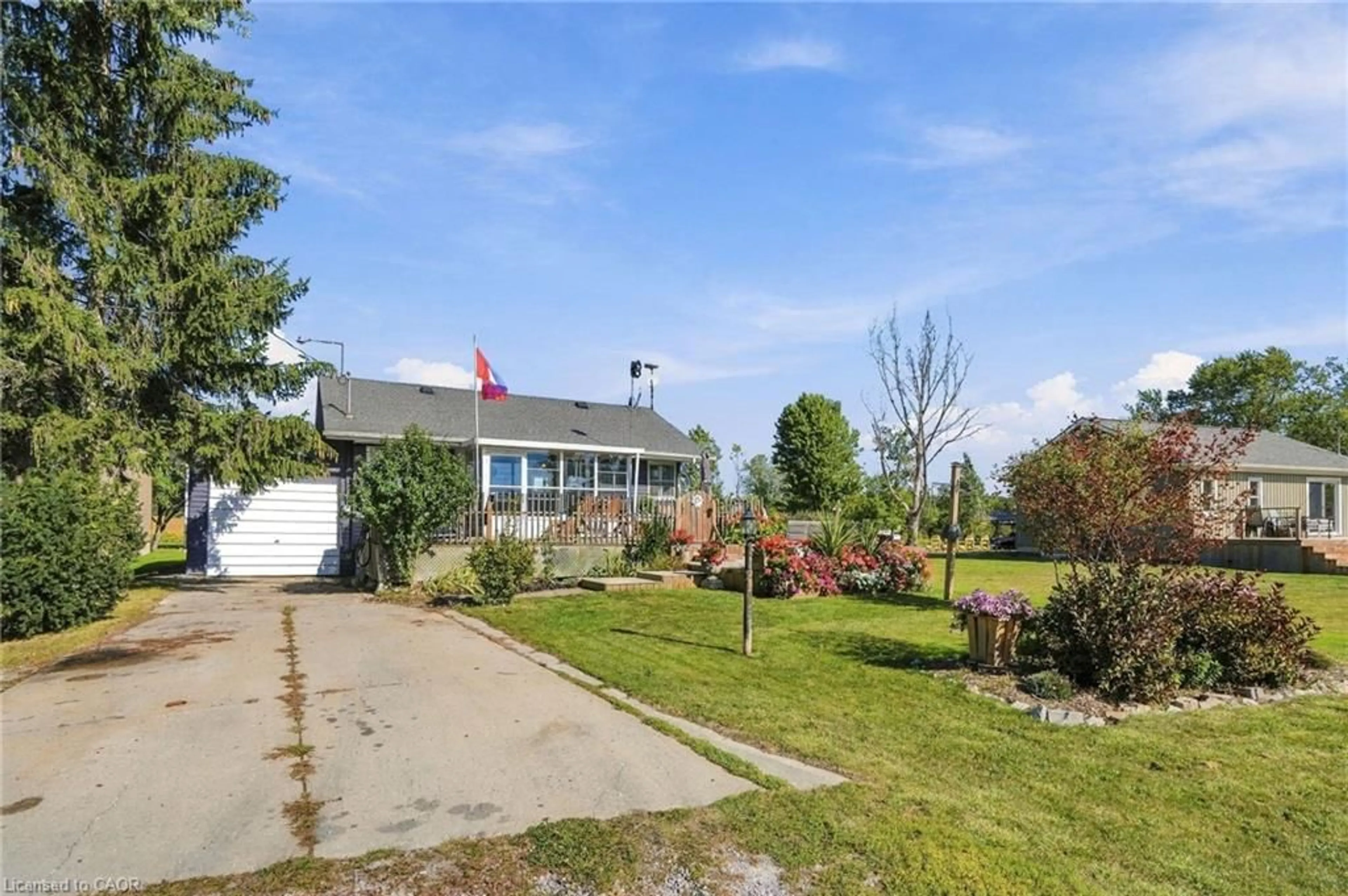A pic from outside/outdoor area/front of a property/back of a property/a pic from drone, street for 2579 Lakeshore Rd, Dunnville Ontario N1A 2W8