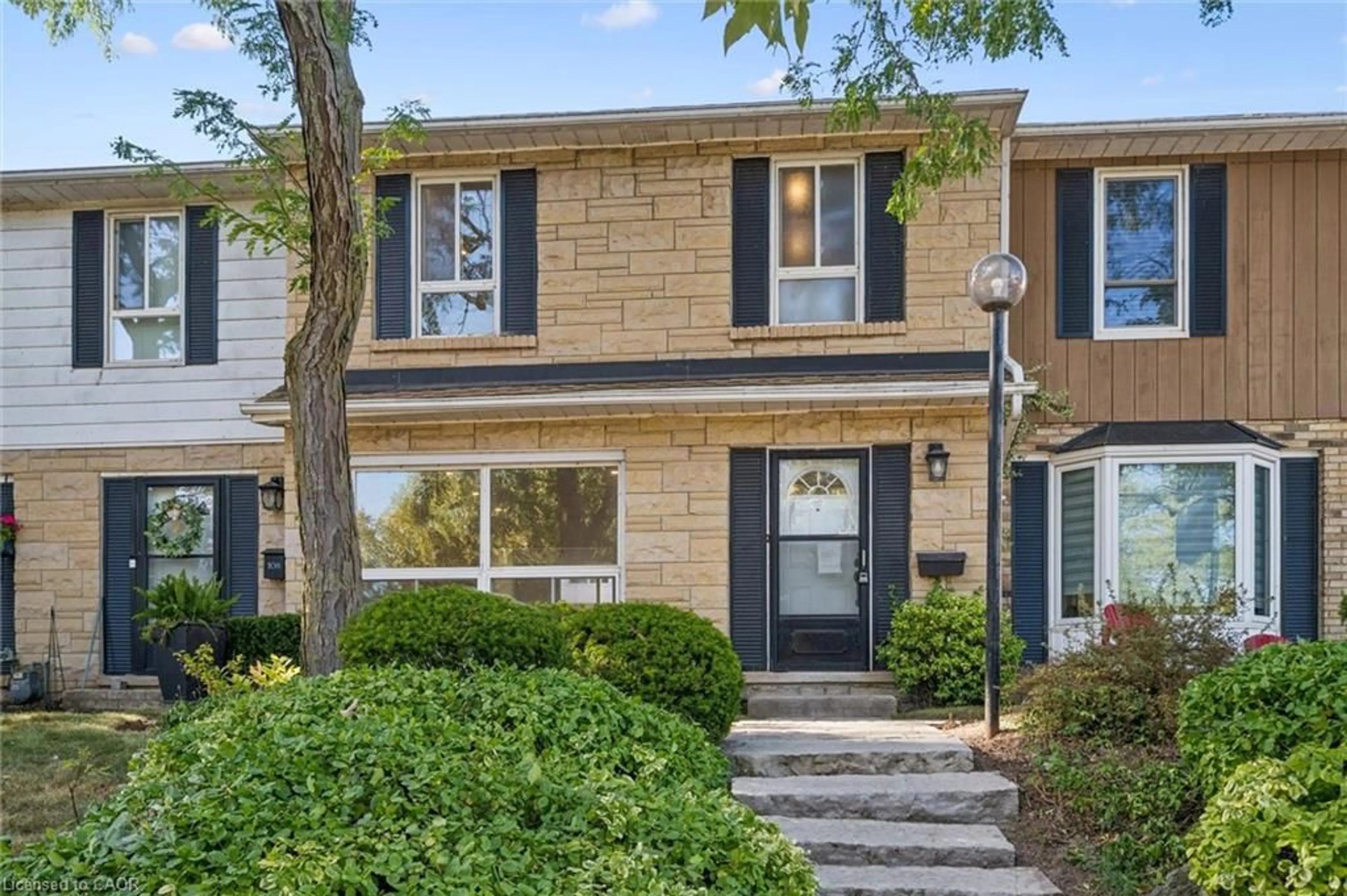 Home with brick exterior material, street for 5475 Lakeshore Rd #107, Burlington Ontario L7L 1E1