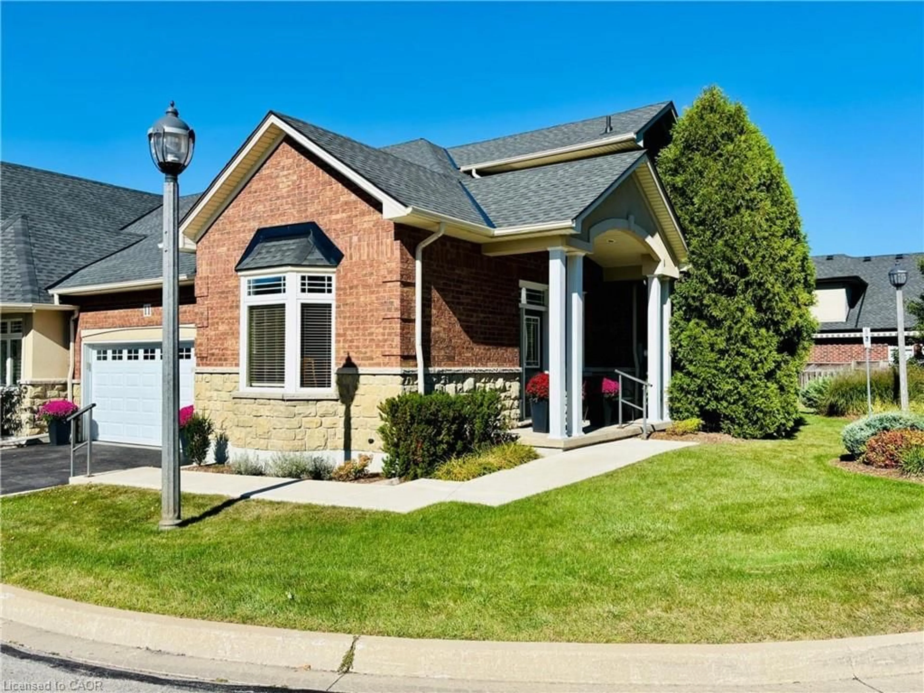 Home with brick exterior material, street for 11 Carmichael Trail, Ancaster Ontario L9K 0A1