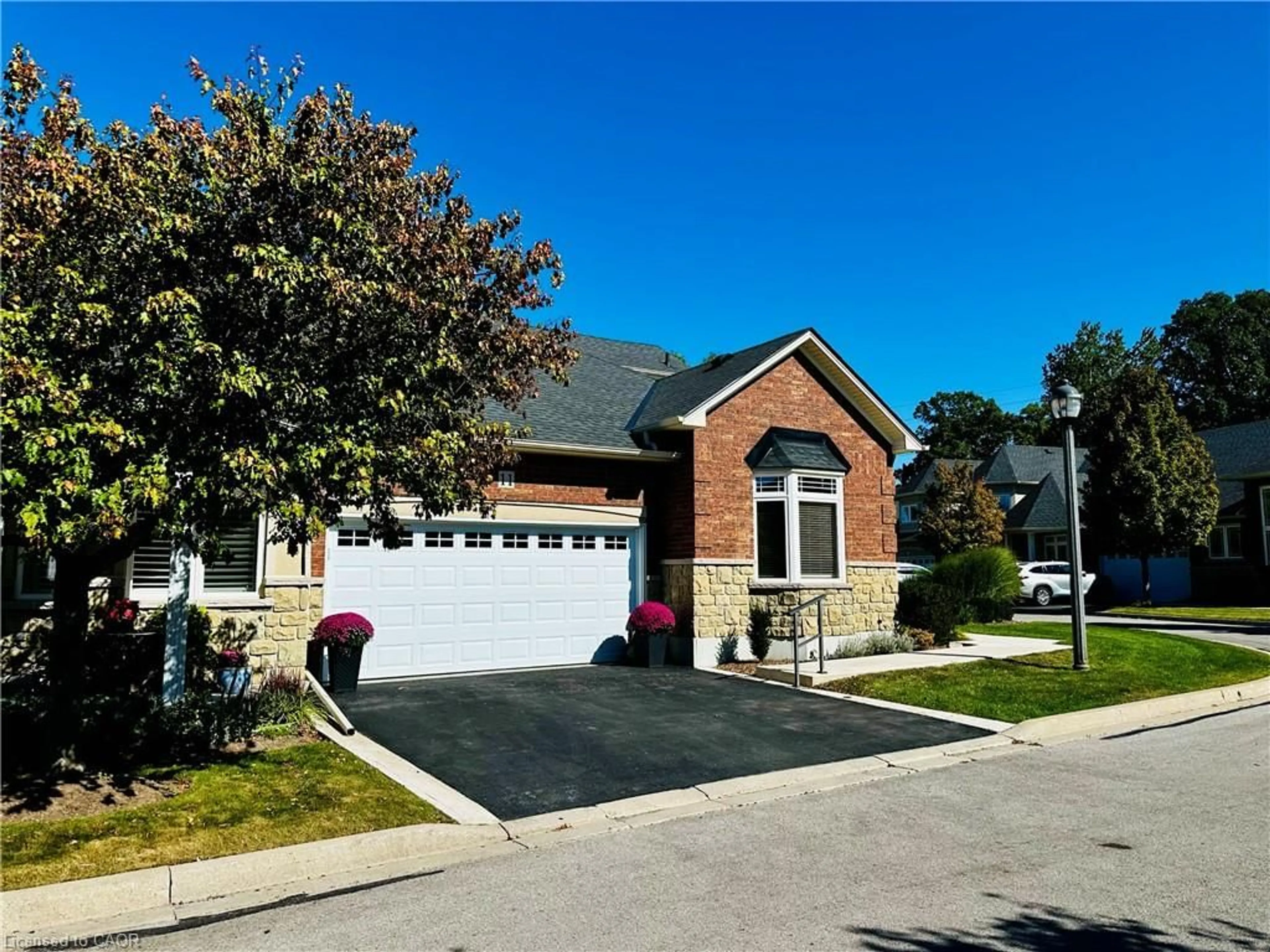 Home with brick exterior material, street for 11 Carmichael Trail, Ancaster Ontario L9K 0A1
