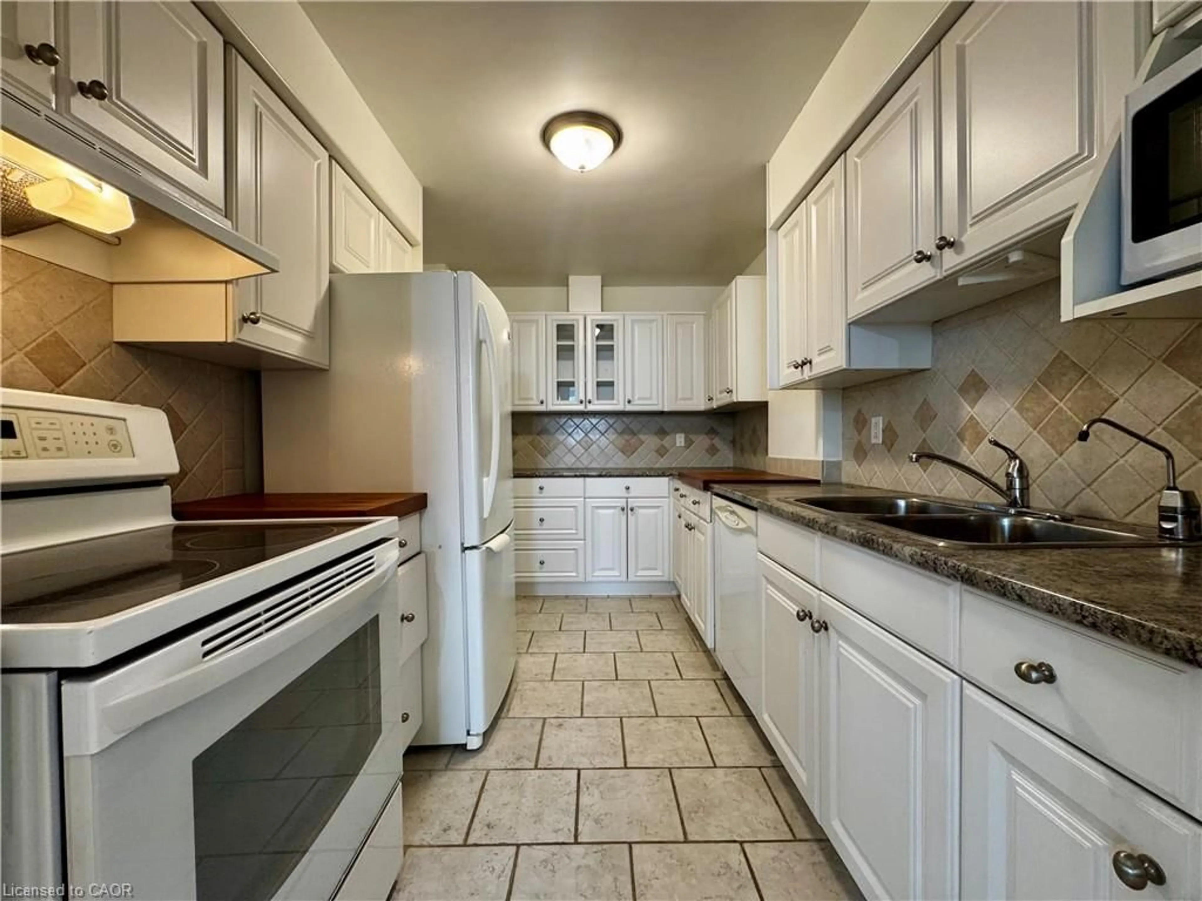 Standard kitchen, ceramic/tile floor for 35 Towering Heights Blvd #809, St. Catharines Ontario L2T 3G8