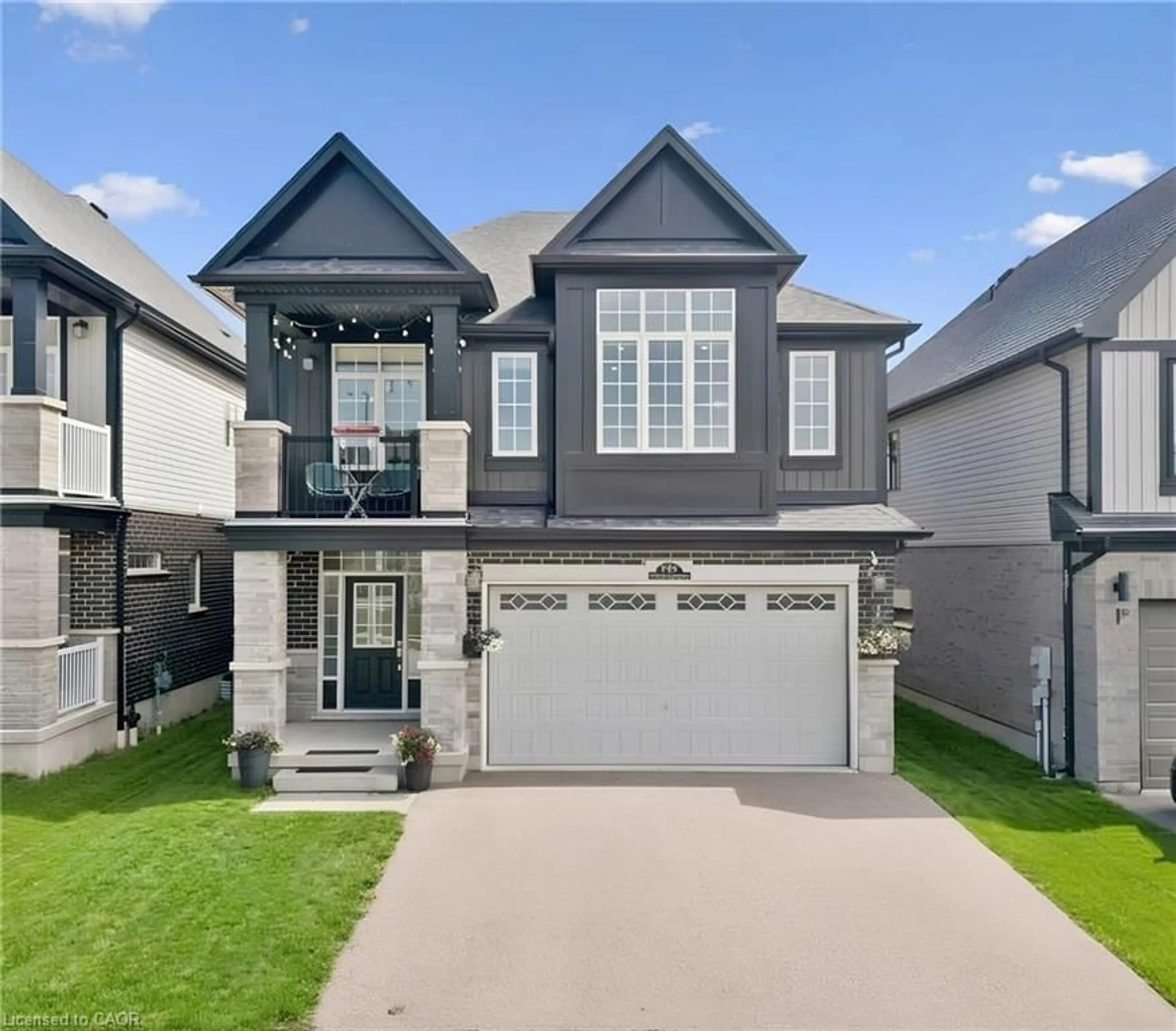 Home with vinyl exterior material, street for 736 Wood Lily St, Waterloo Ontario N2V 0C3