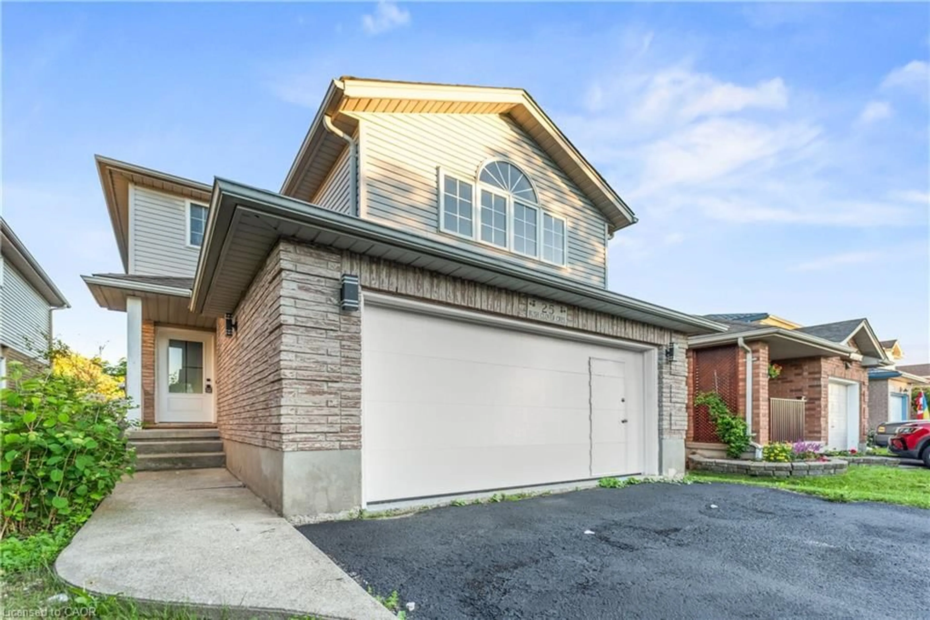 Home with brick exterior material, street for 25 Bush Clover Cres, Kitchener Ontario N2E 3P9