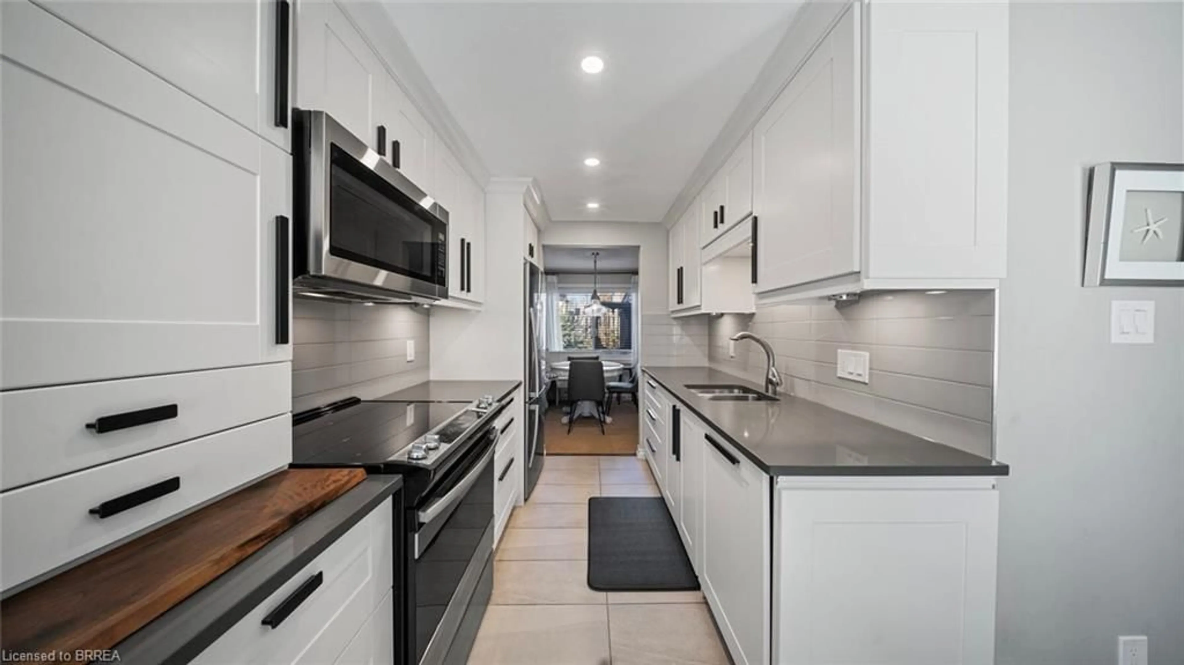 Standard kitchen, ceramic/tile floor for 23 Freeman Cres, Simcoe Ontario N3Y 5J9