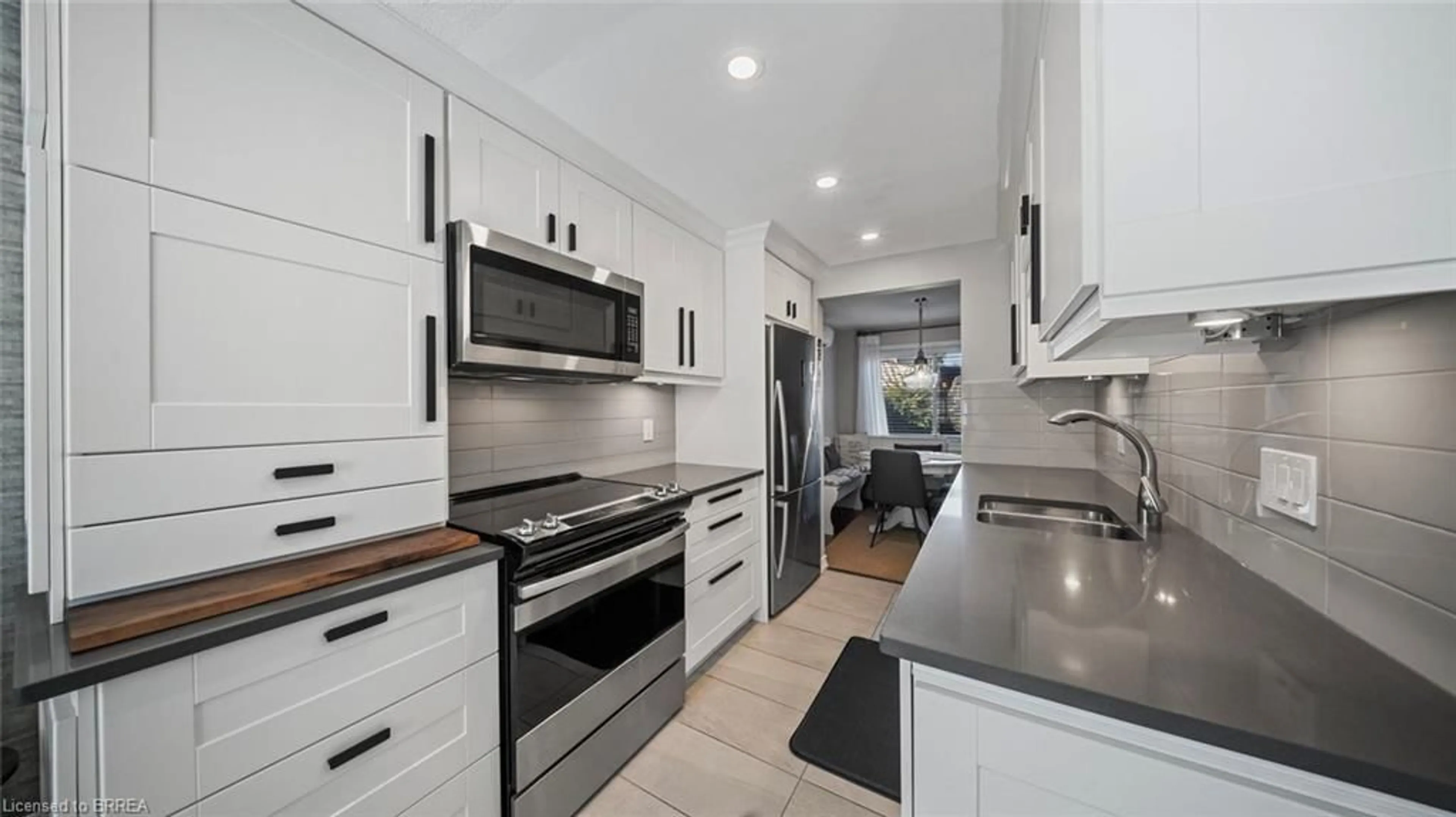 Open concept kitchen, ceramic/tile floor for 23 Freeman Cres, Simcoe Ontario N3Y 5J9