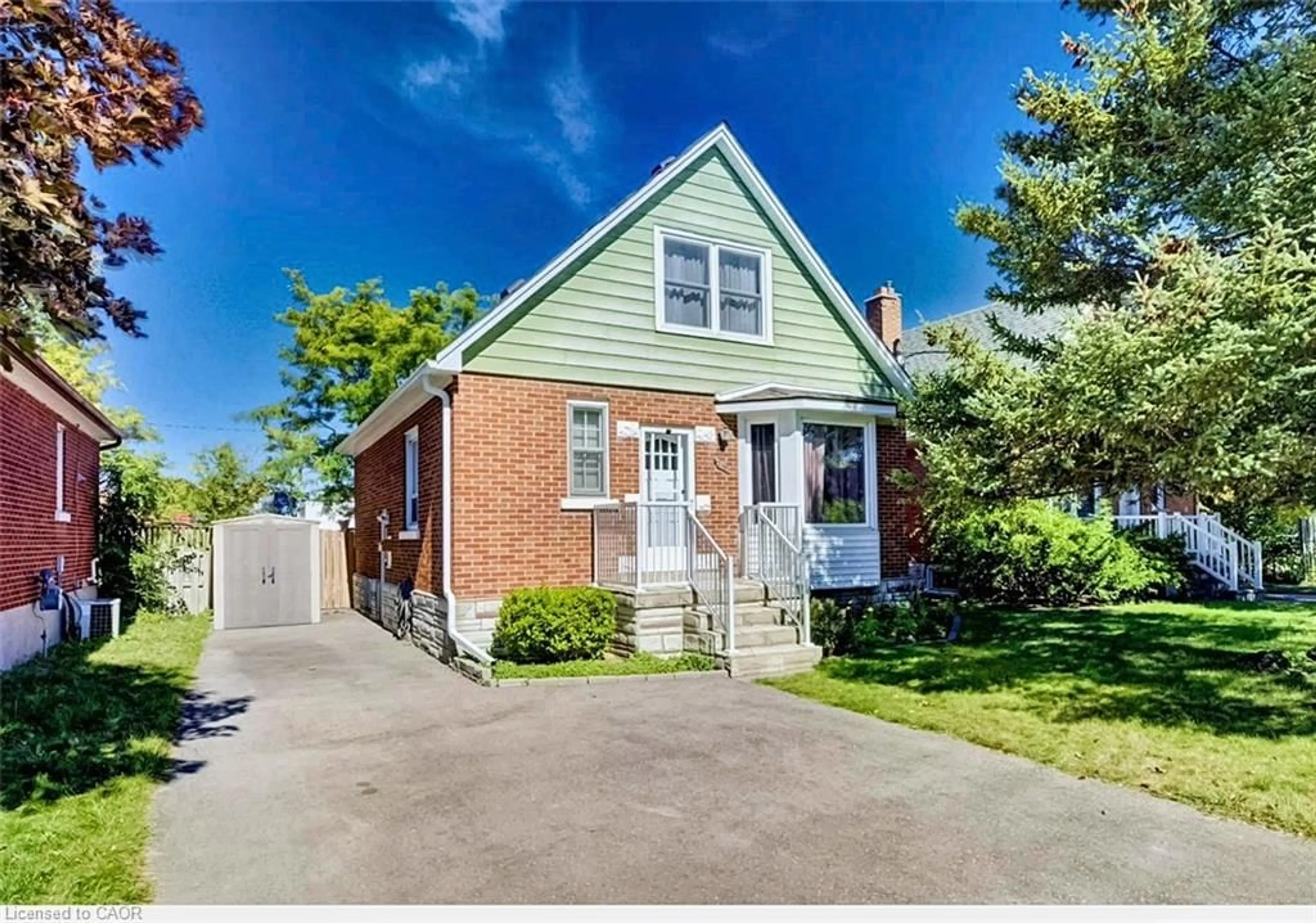 Home with brick exterior material, street for 208 Arnold St, Kitchener Ontario N2H 6E7