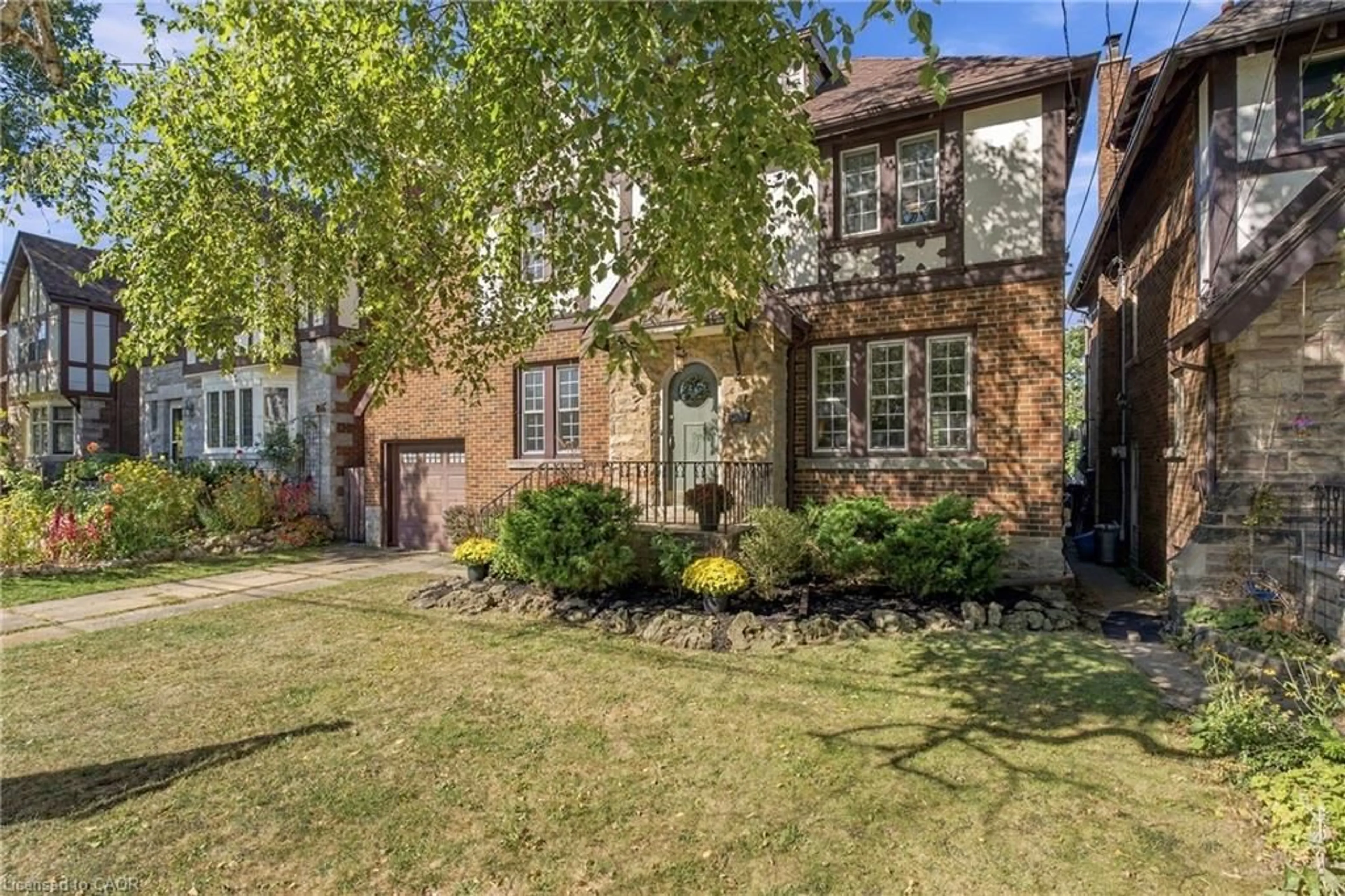 Home with brick exterior material, street for 48 Rothsay Ave, Hamilton Ontario L8M 3G1