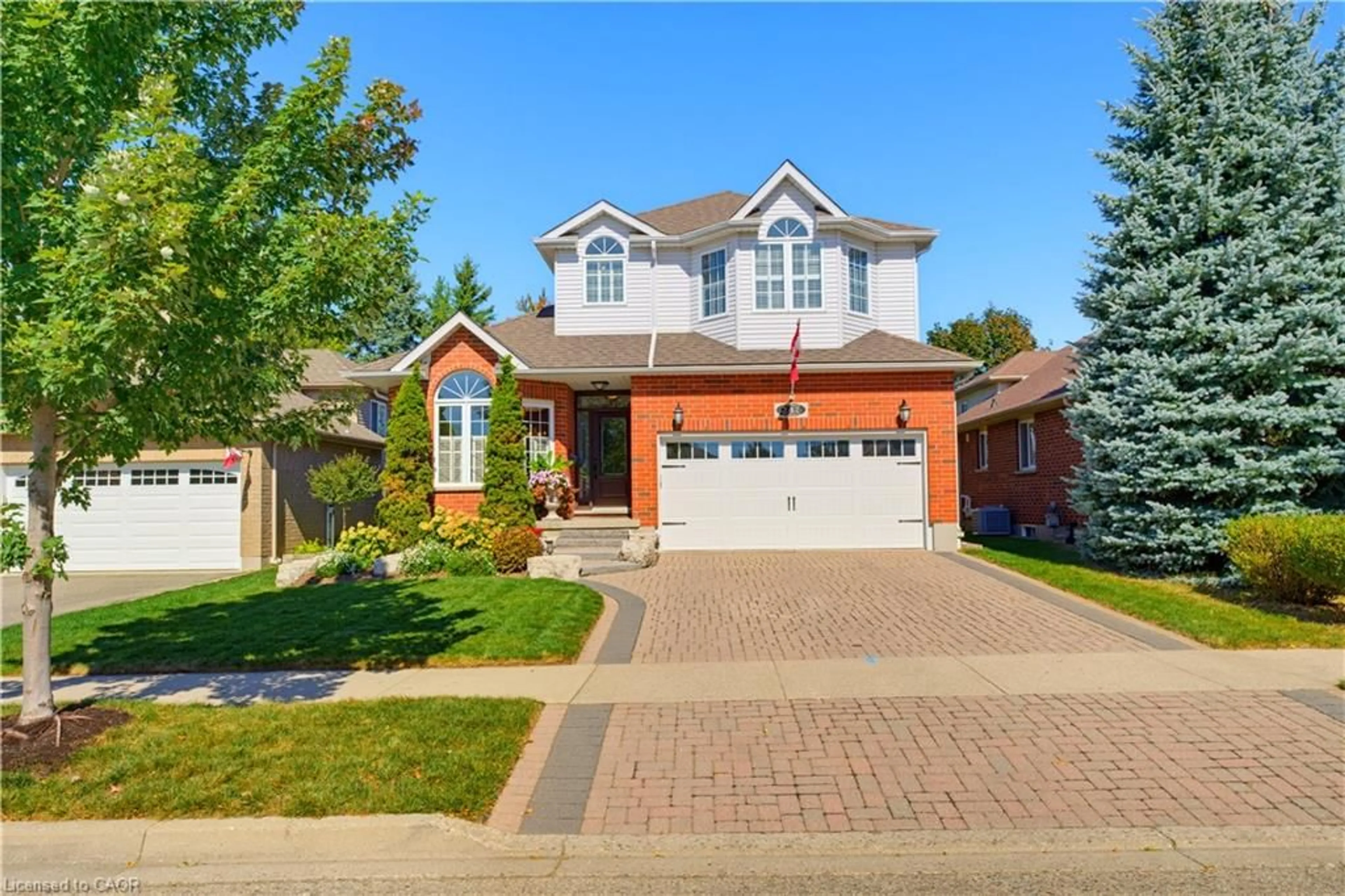 Home with brick exterior material, street for 247 Fern Cres, Waterloo Ontario N2V 2P9