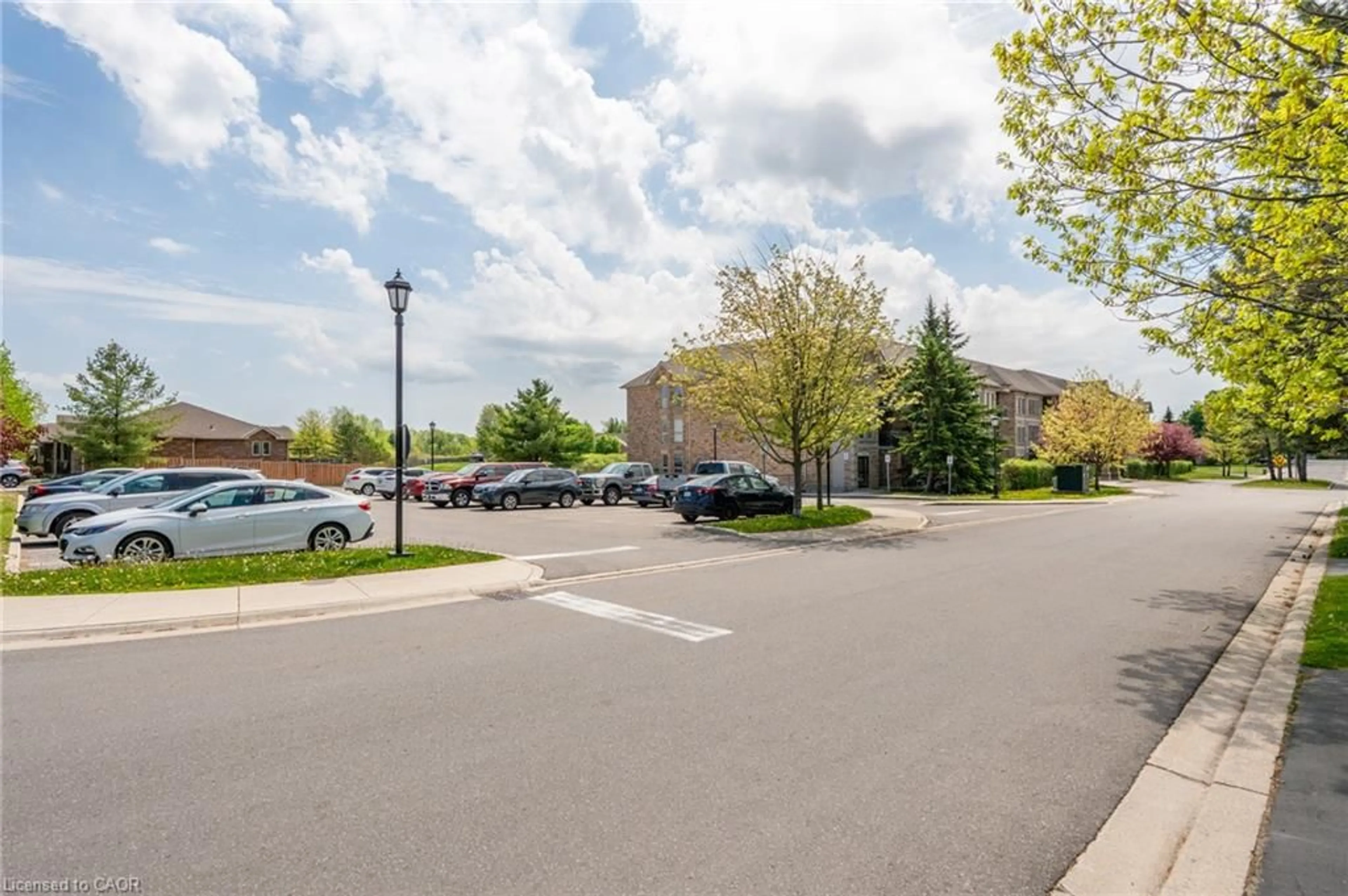 Patio, street for 59 Critzia Dr #208, Mount Hope Ontario L0R 1W0