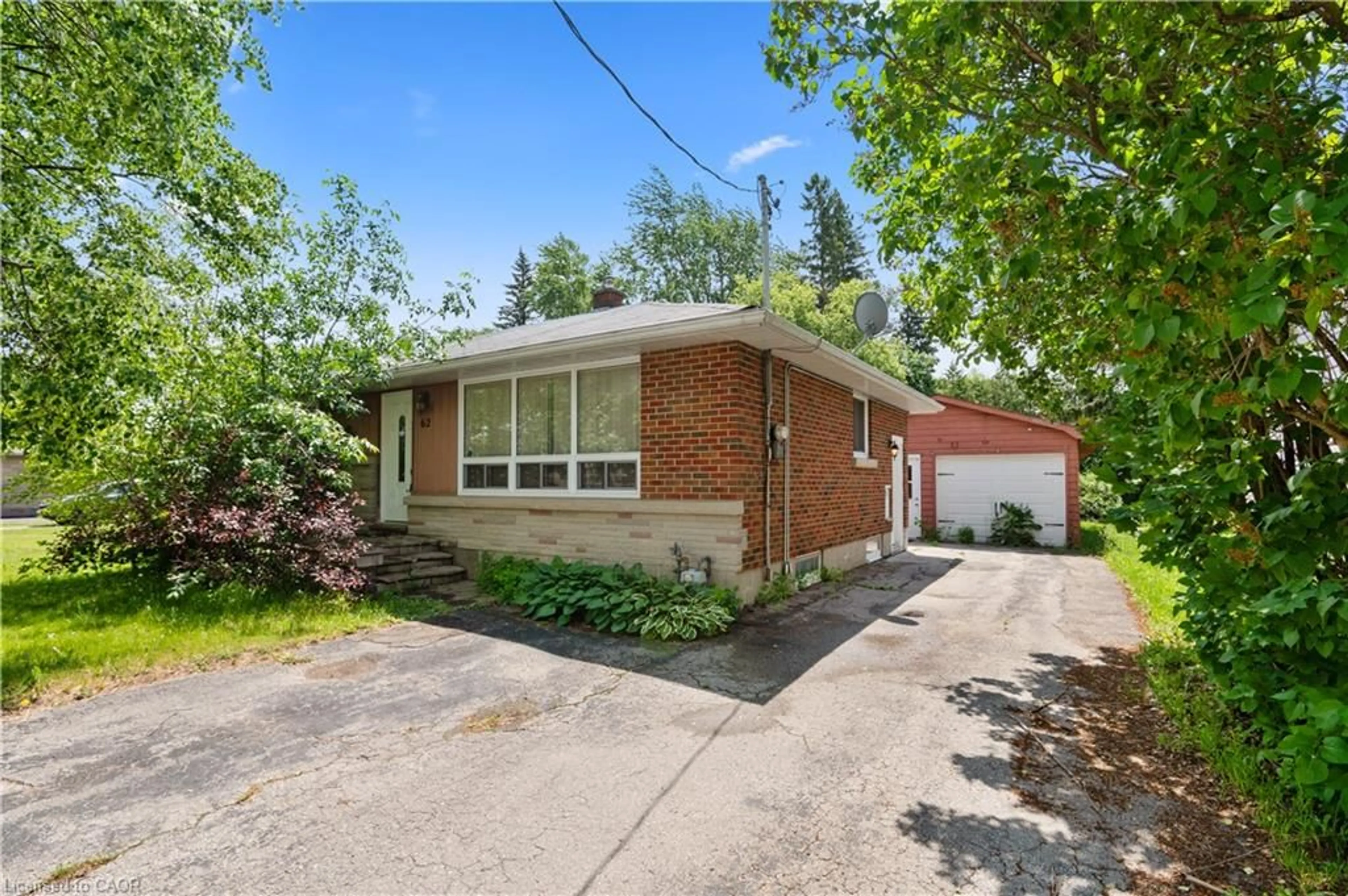 Home with brick exterior material, street for 62 Elizabeth St, Orangeville Ontario L9W 1C6