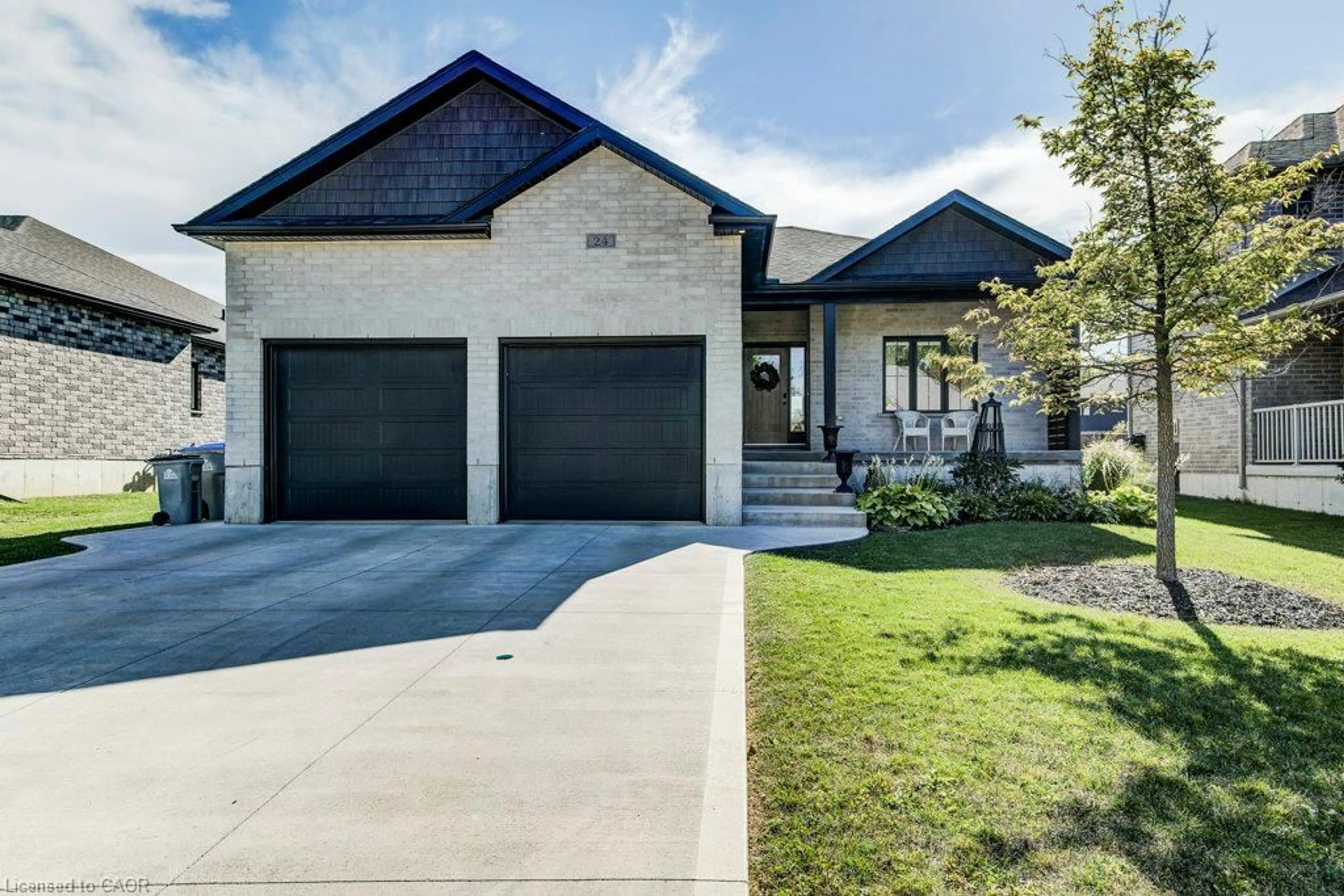 Home with brick exterior material, street for 24 Gilmer Cres, Listowel Ontario N4W 0H2
