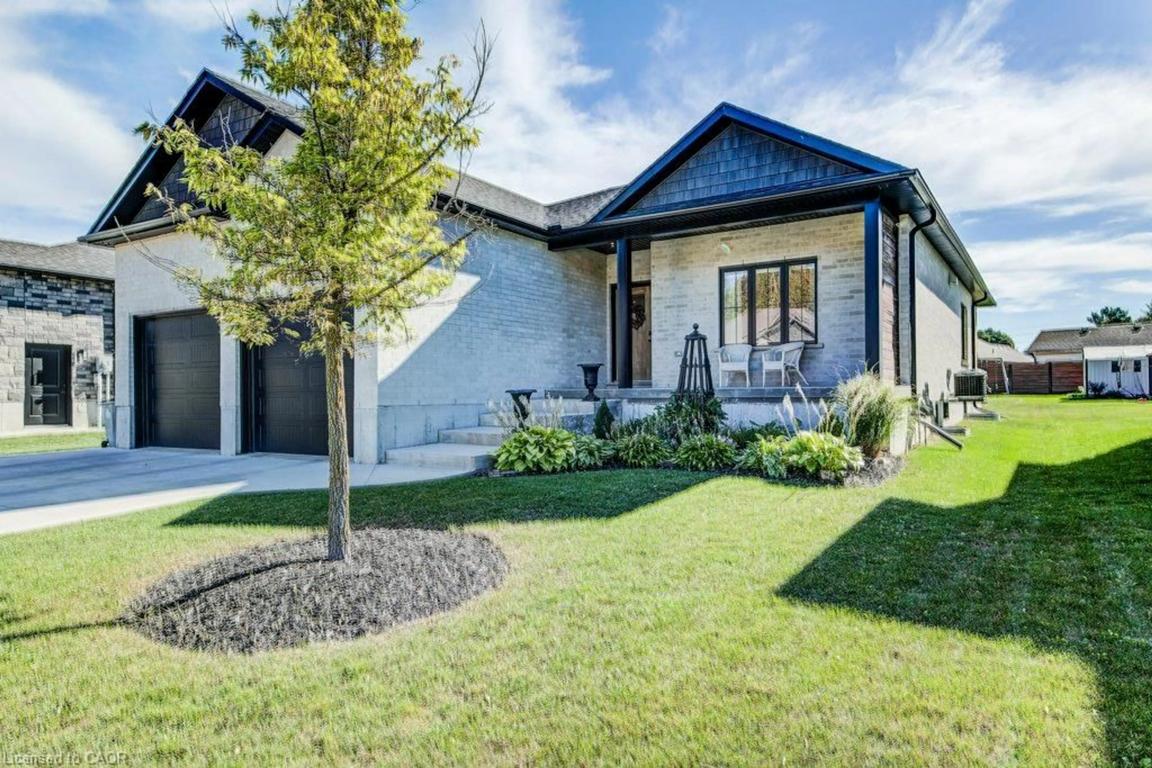 Home with brick exterior material, street for 24 Gilmer Cres, Listowel Ontario N4W 0H2