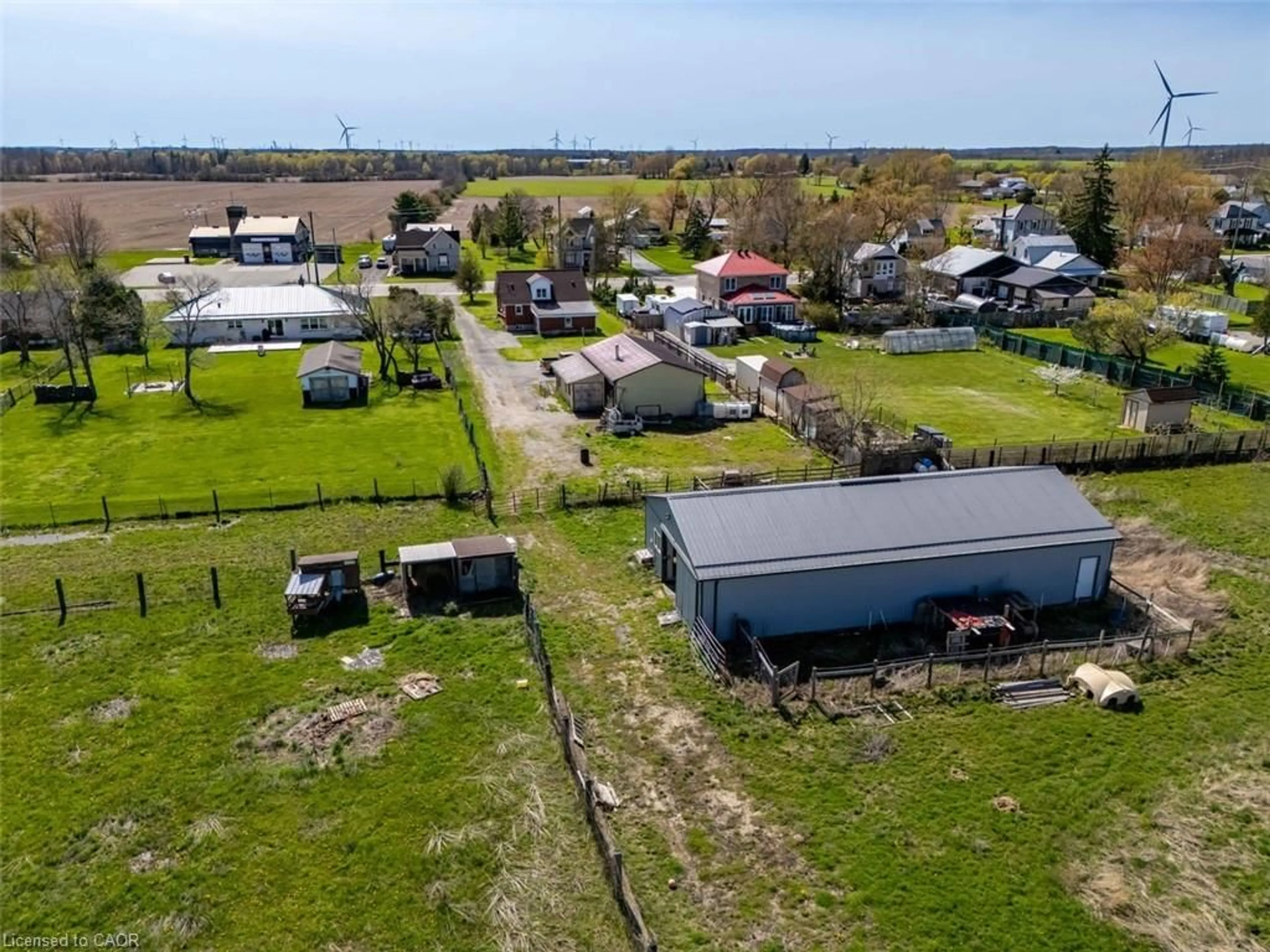 A pic from outside/outdoor area/front of a property/back of a property/a pic from drone, street for 23 Erie Ave, Fisherville Ontario N0A 1G0