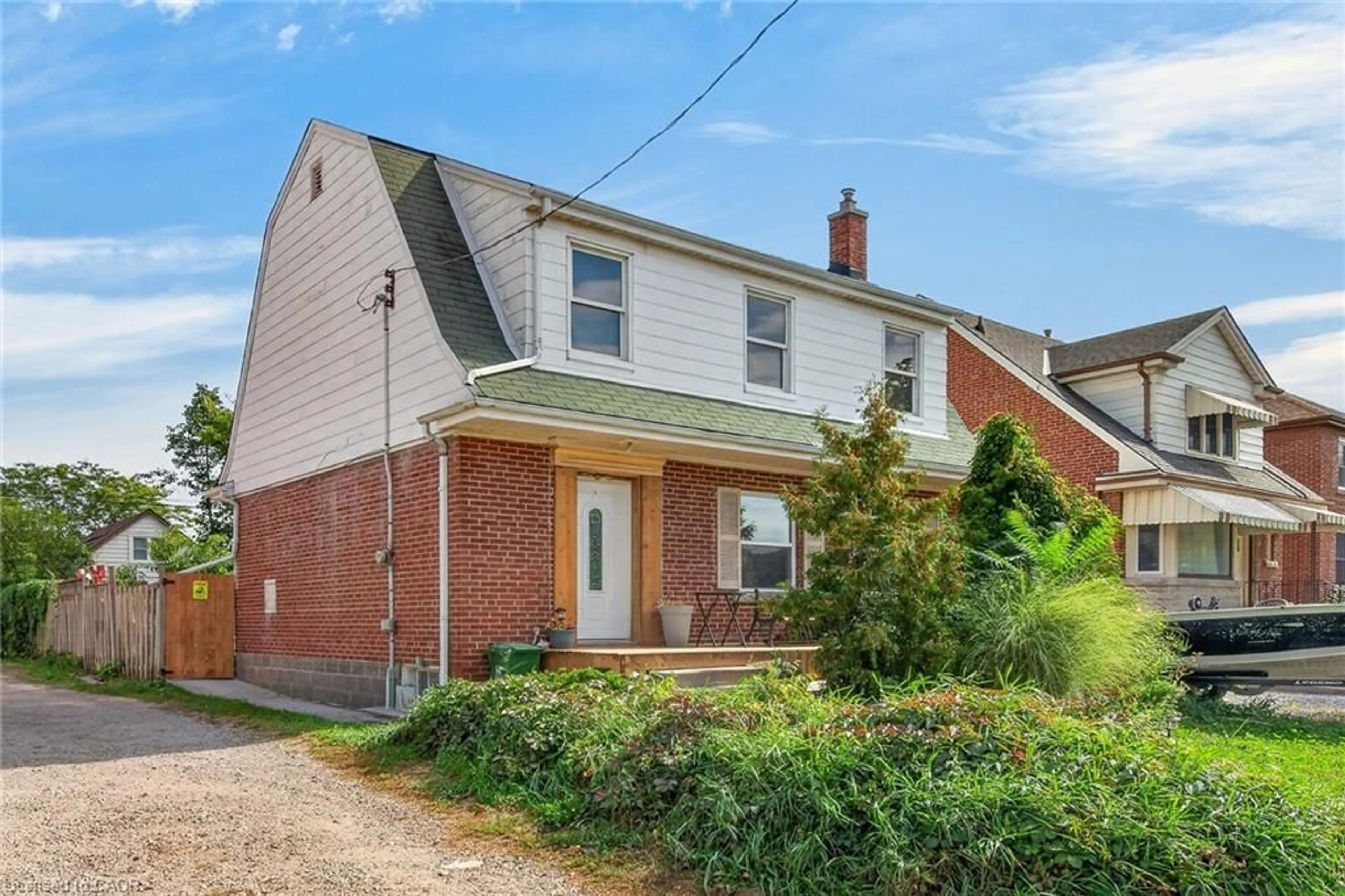 Home with brick exterior material, street for 111 Kenilworth Ave, Hamilton Ontario L8K 2T2