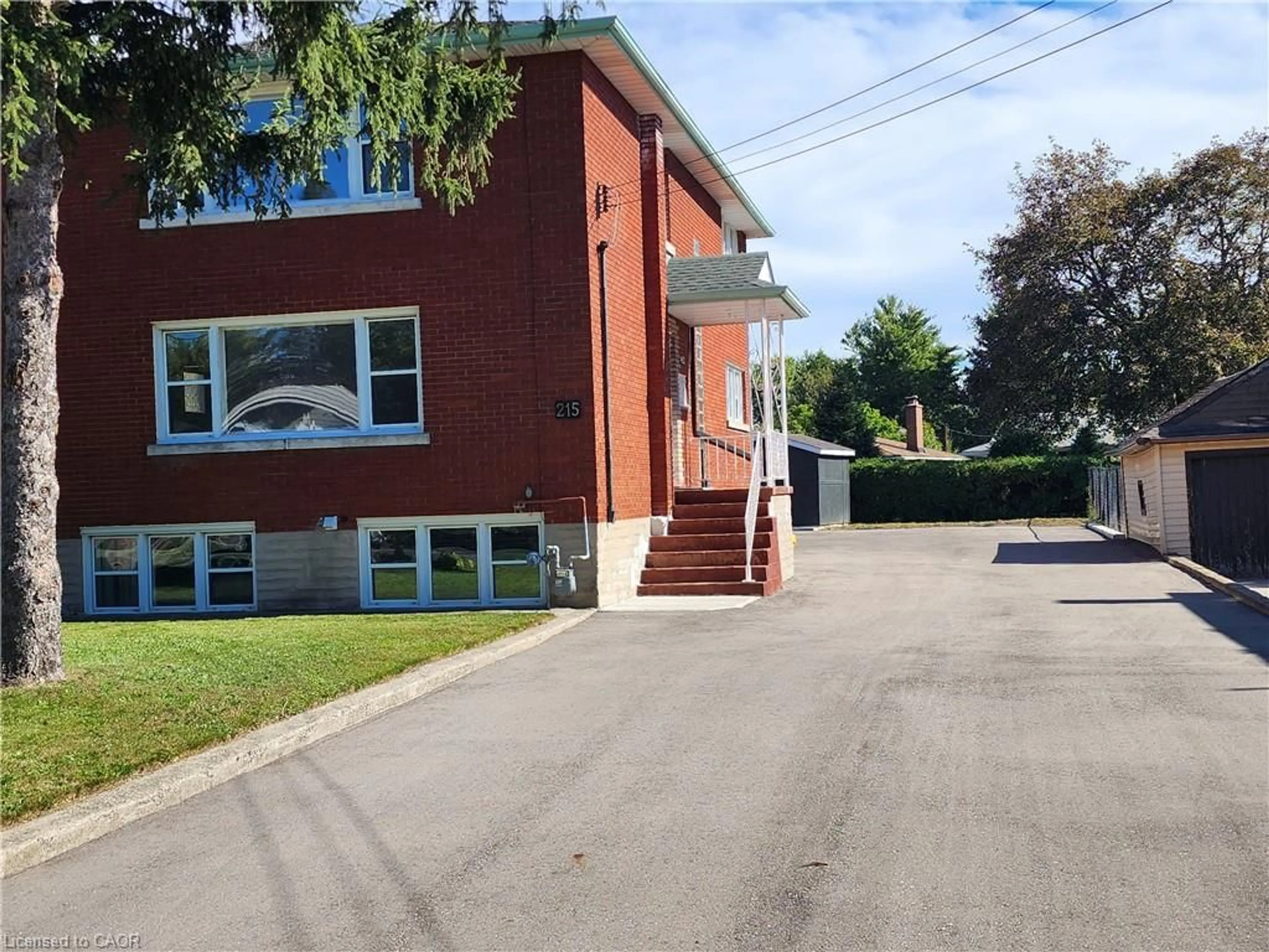 Home with brick exterior material, street for 215 Belleview Ave, Kitchener Ontario N2B 1G6