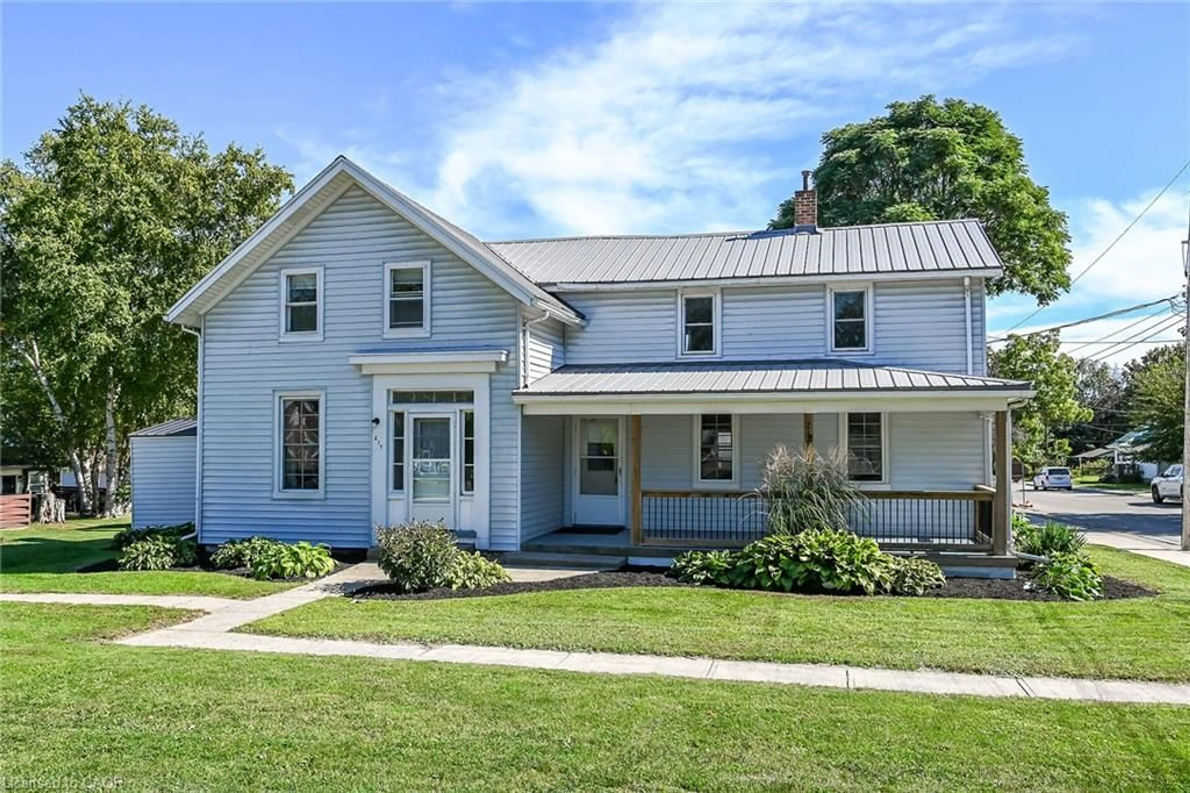 Home with vinyl exterior material, street for 217-219 Nelson St, Port Dover Ontario N0A 1N0