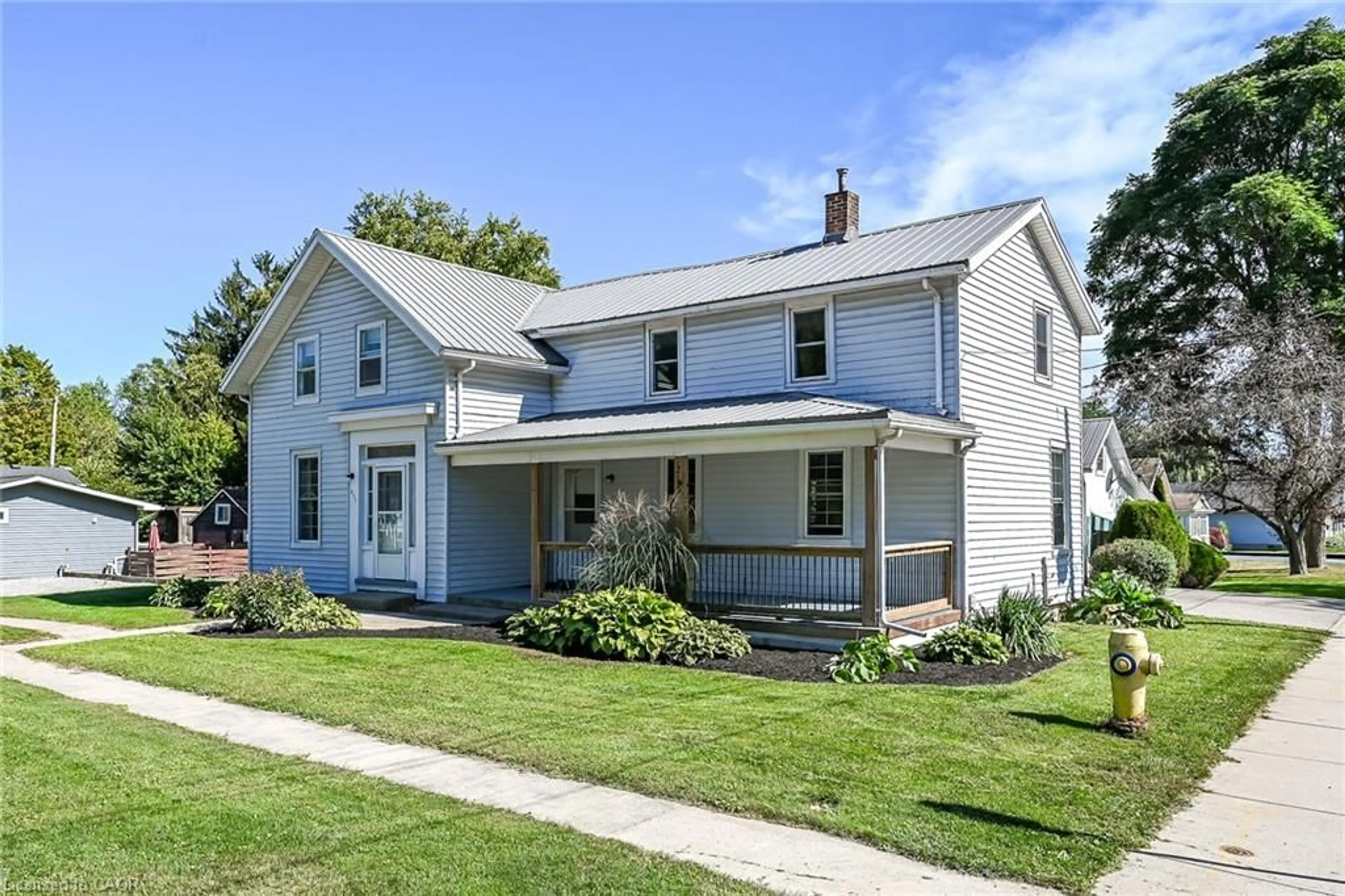 Home with vinyl exterior material, street for 217-219 Nelson St, Port Dover Ontario N0A 1N0