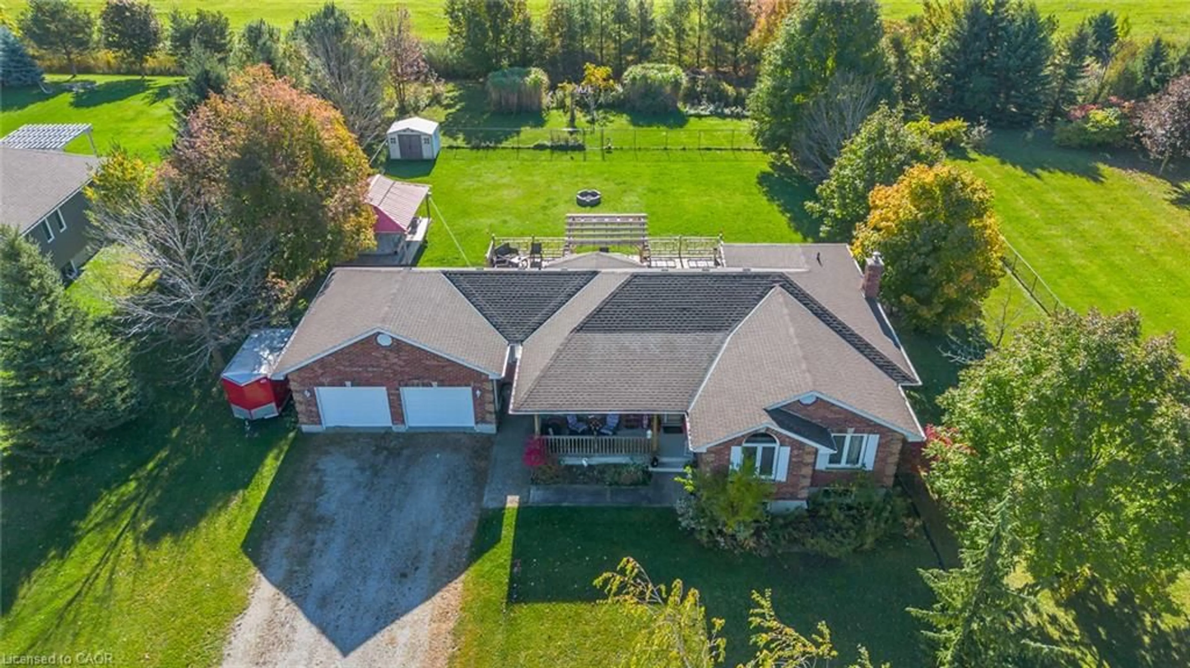 A pic from outside/outdoor area/front of a property/back of a property/a pic from drone, street for 30 Nesbitt St, Mapleton Ontario N0B 1A0