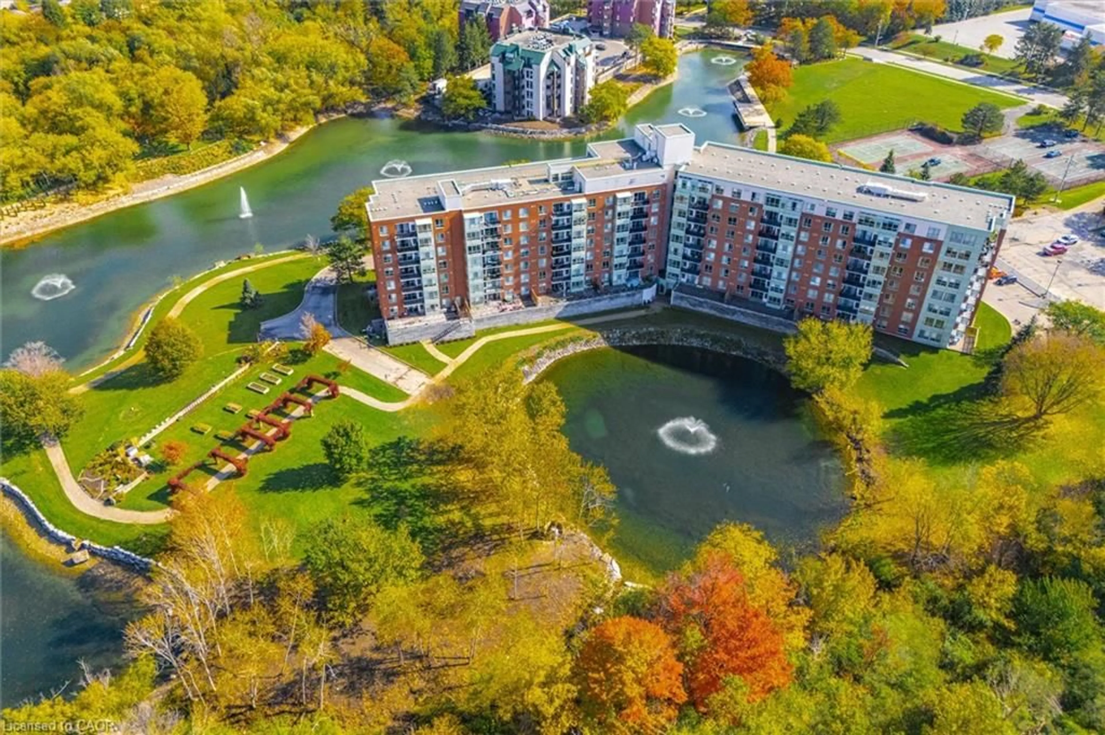 A pic from outside/outdoor area/front of a property/back of a property/a pic from drone, water/lake/river/ocean view for 30 Blue Springs Dr #308, Waterloo Ontario N2J 4T2