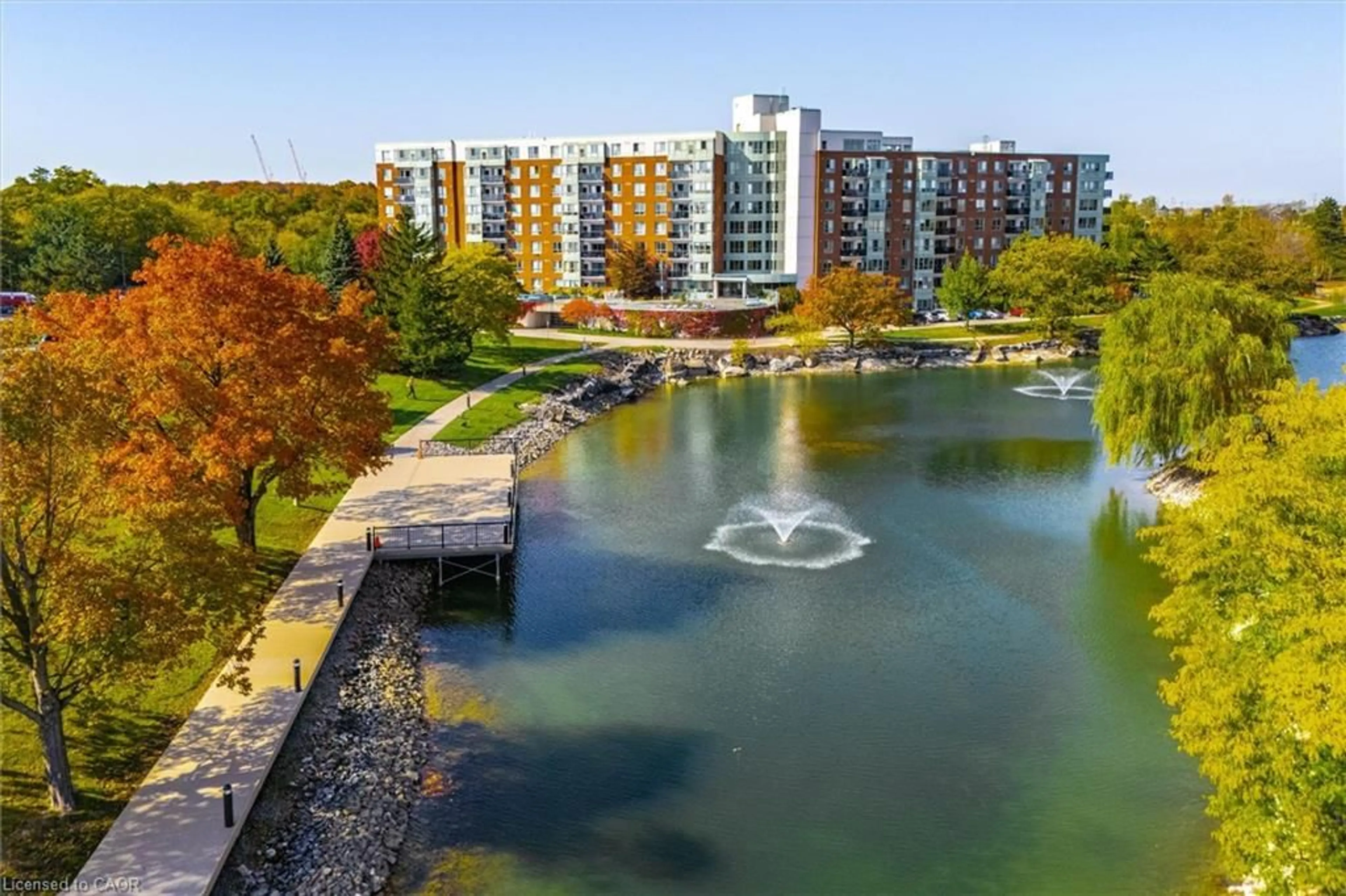 A pic from outside/outdoor area/front of a property/back of a property/a pic from drone, water/lake/river/ocean view for 30 Blue Springs Dr #308, Waterloo Ontario N2J 4T2