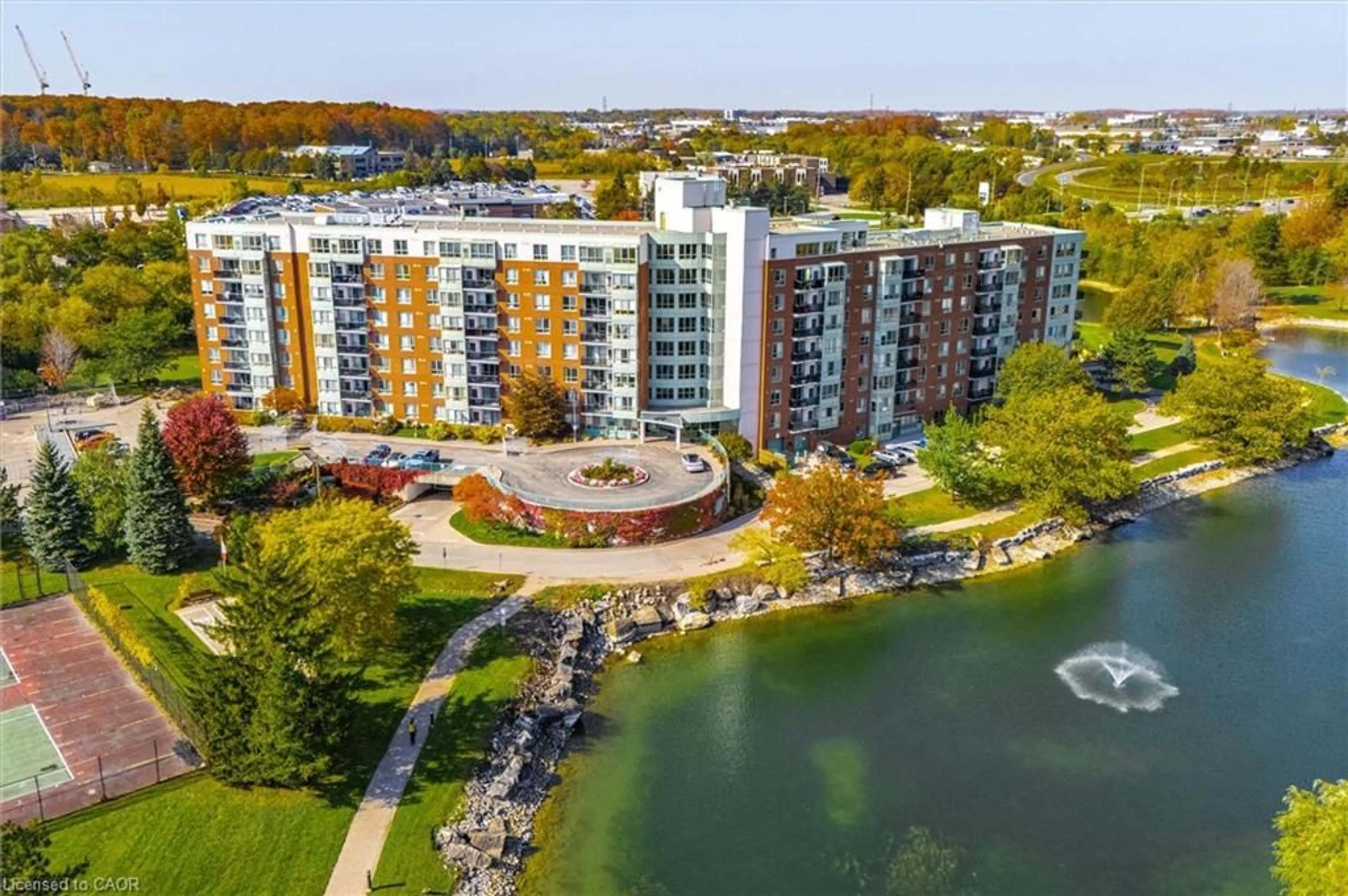 A pic from outside/outdoor area/front of a property/back of a property/a pic from drone, water/lake/river/ocean view for 30 Blue Springs Dr #308, Waterloo Ontario N2J 4T2