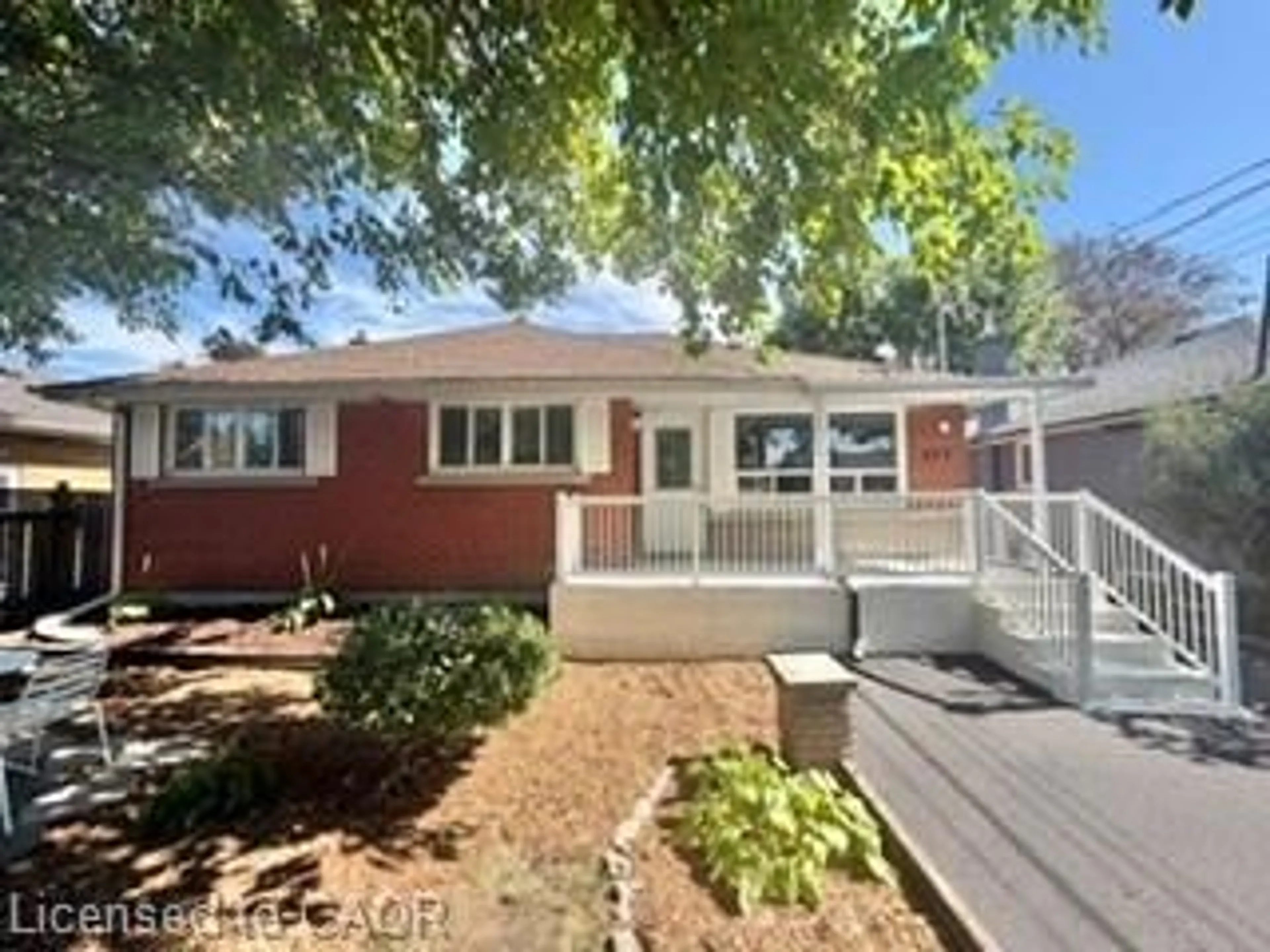 Home with vinyl exterior material, street for 499 East 16th St, Hamilton Ontario L9A 4K9